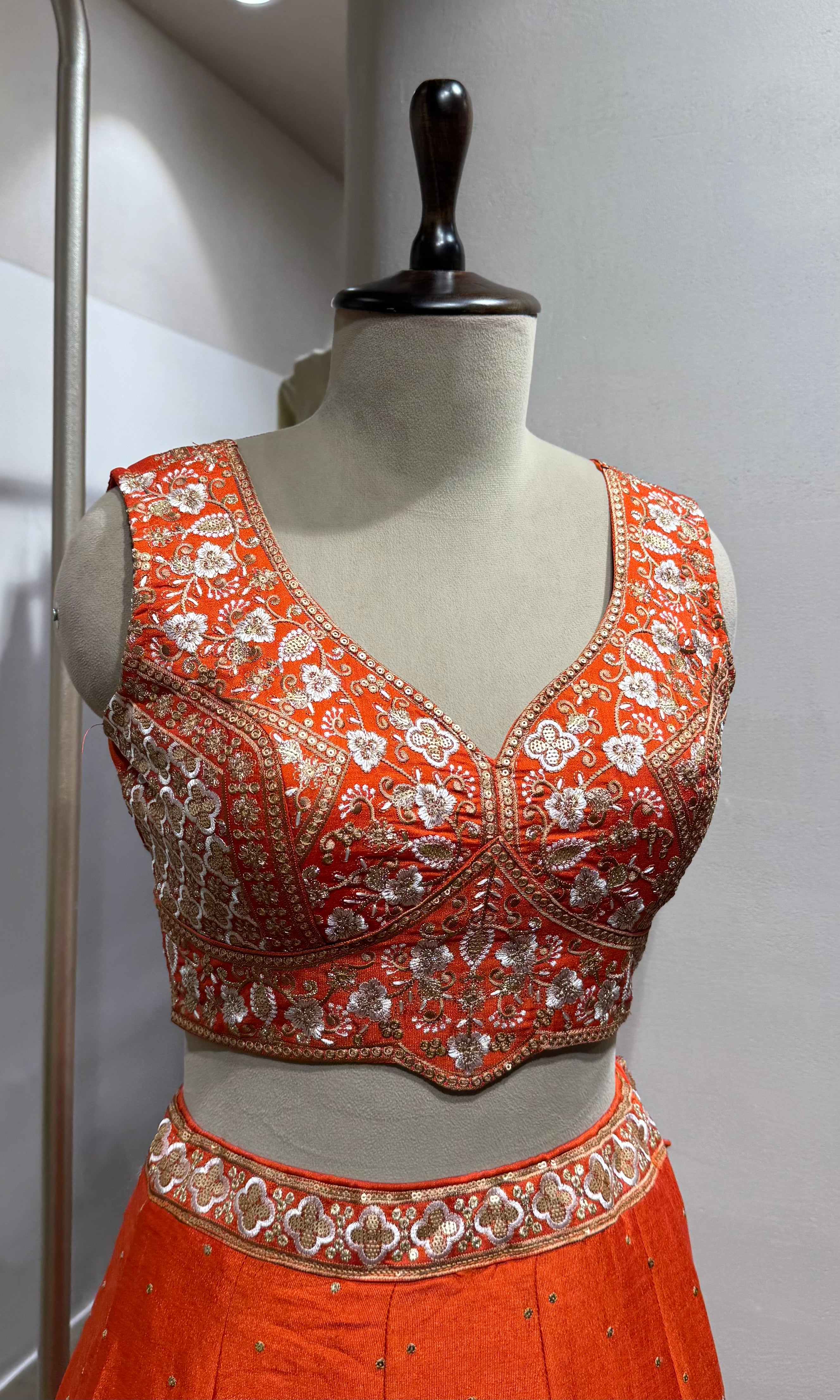 Orange golden embroidery lehenga set