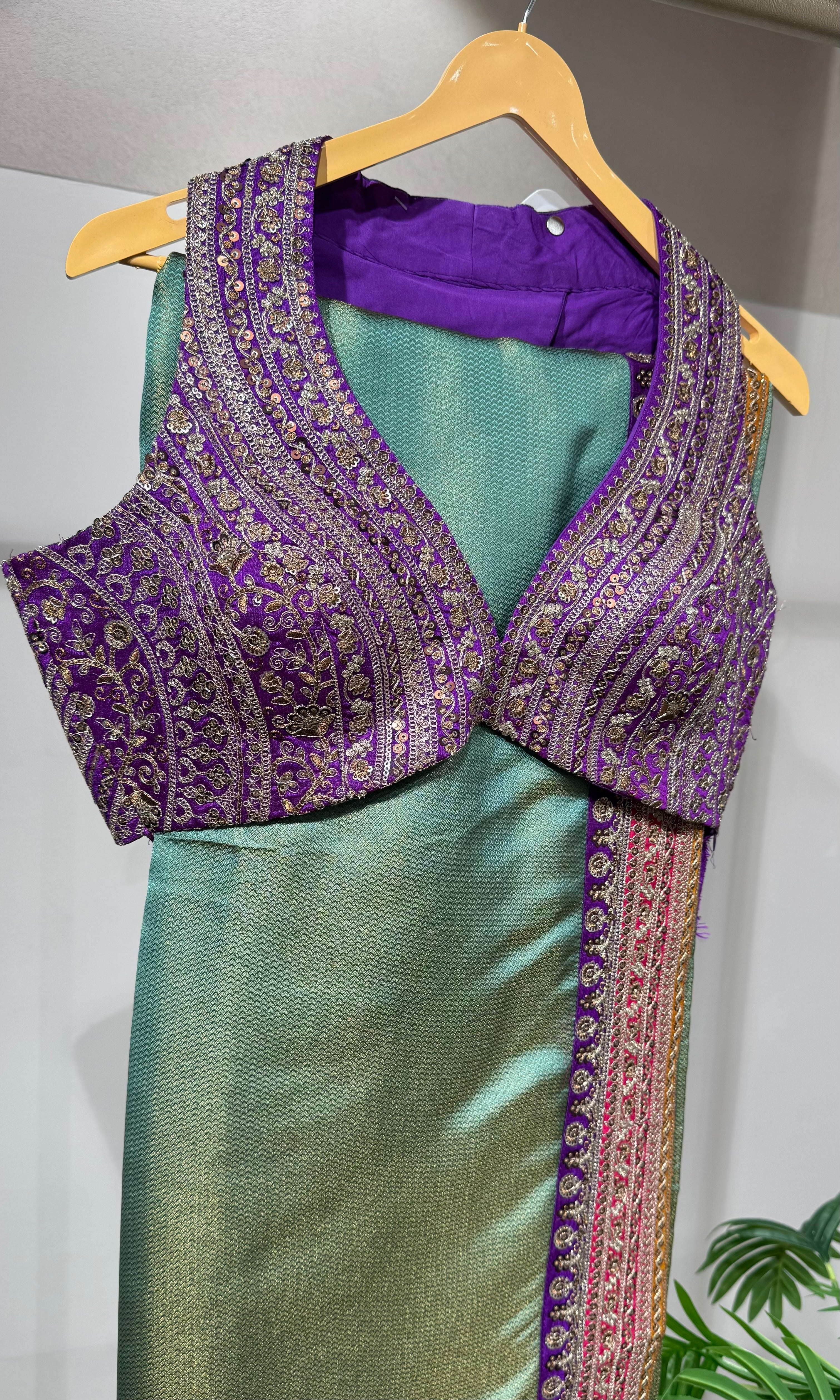Green saree with embroidered blouse