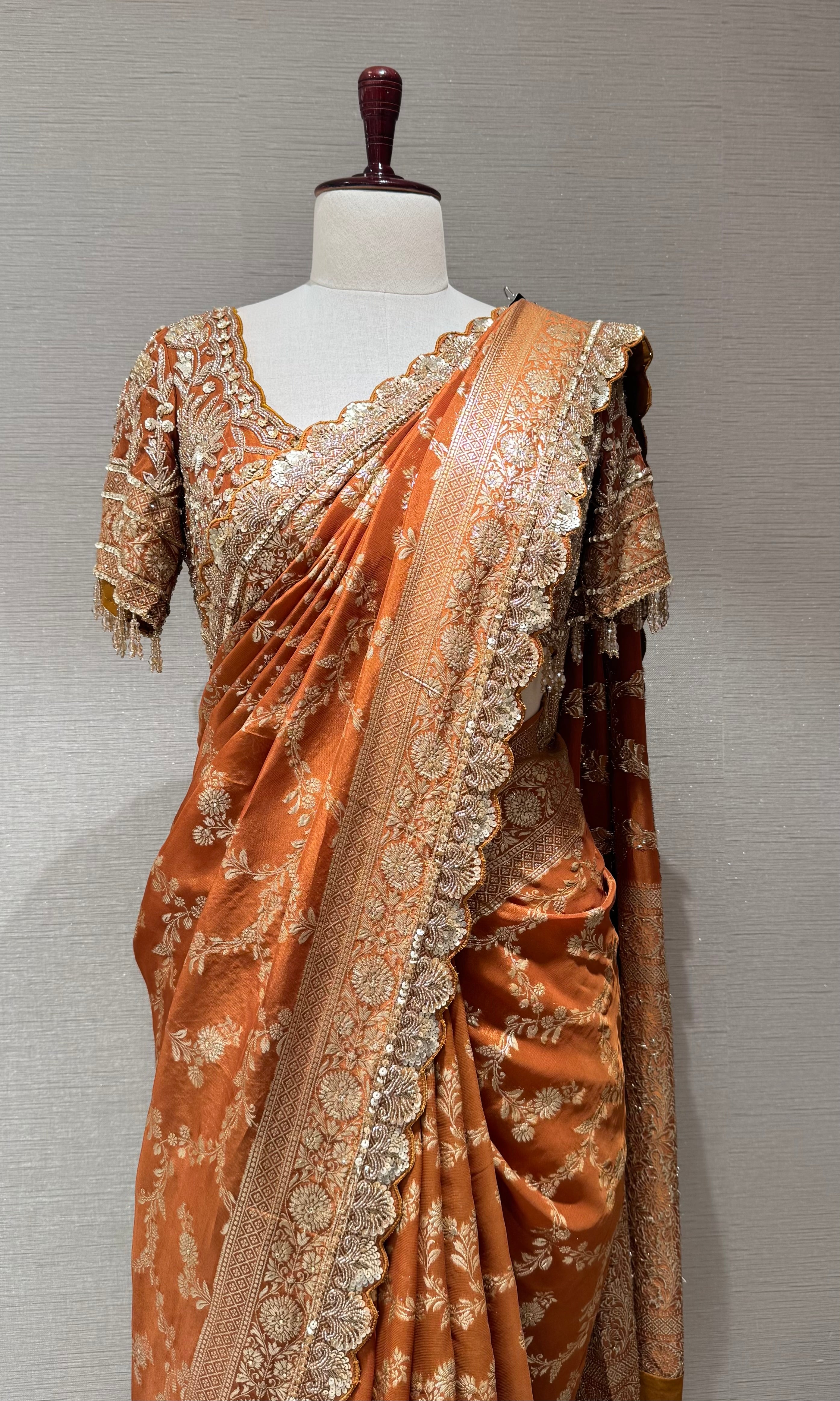Brown designer saree with embroidered blouse