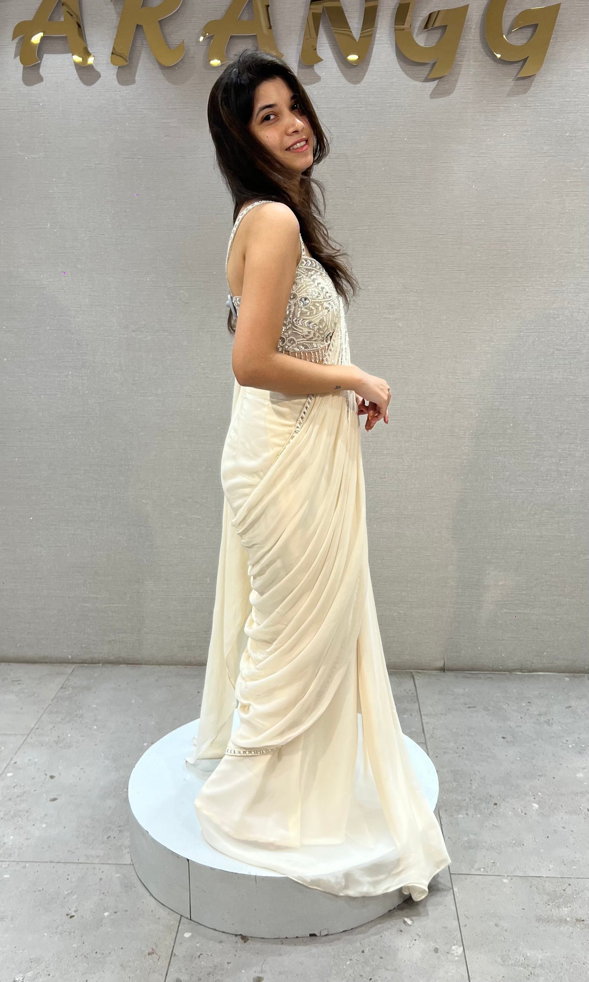 Ivory silk Draped Saree with Embellished Corset Blouse