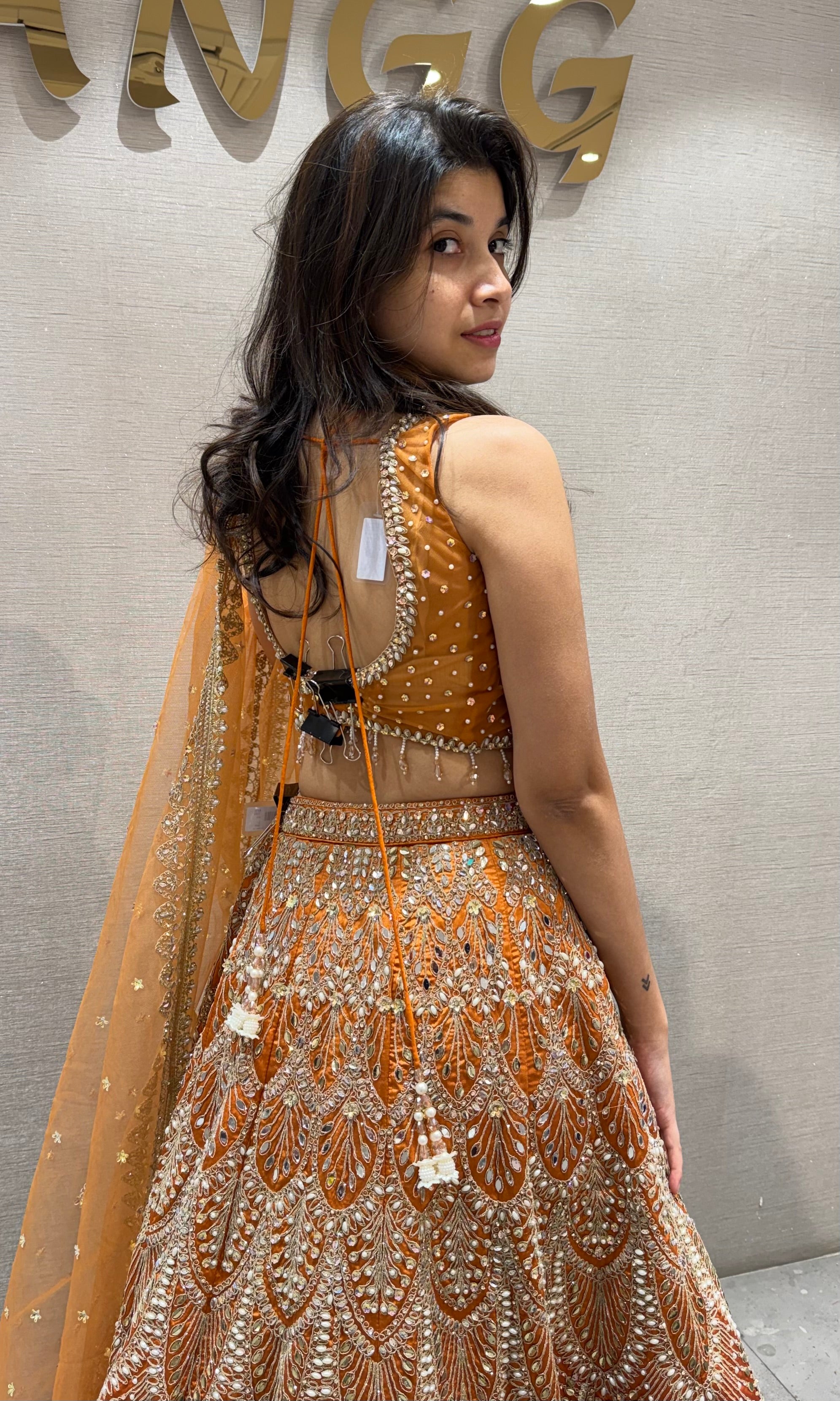 Ornate Rust and Gold Silk Lehenga Choli