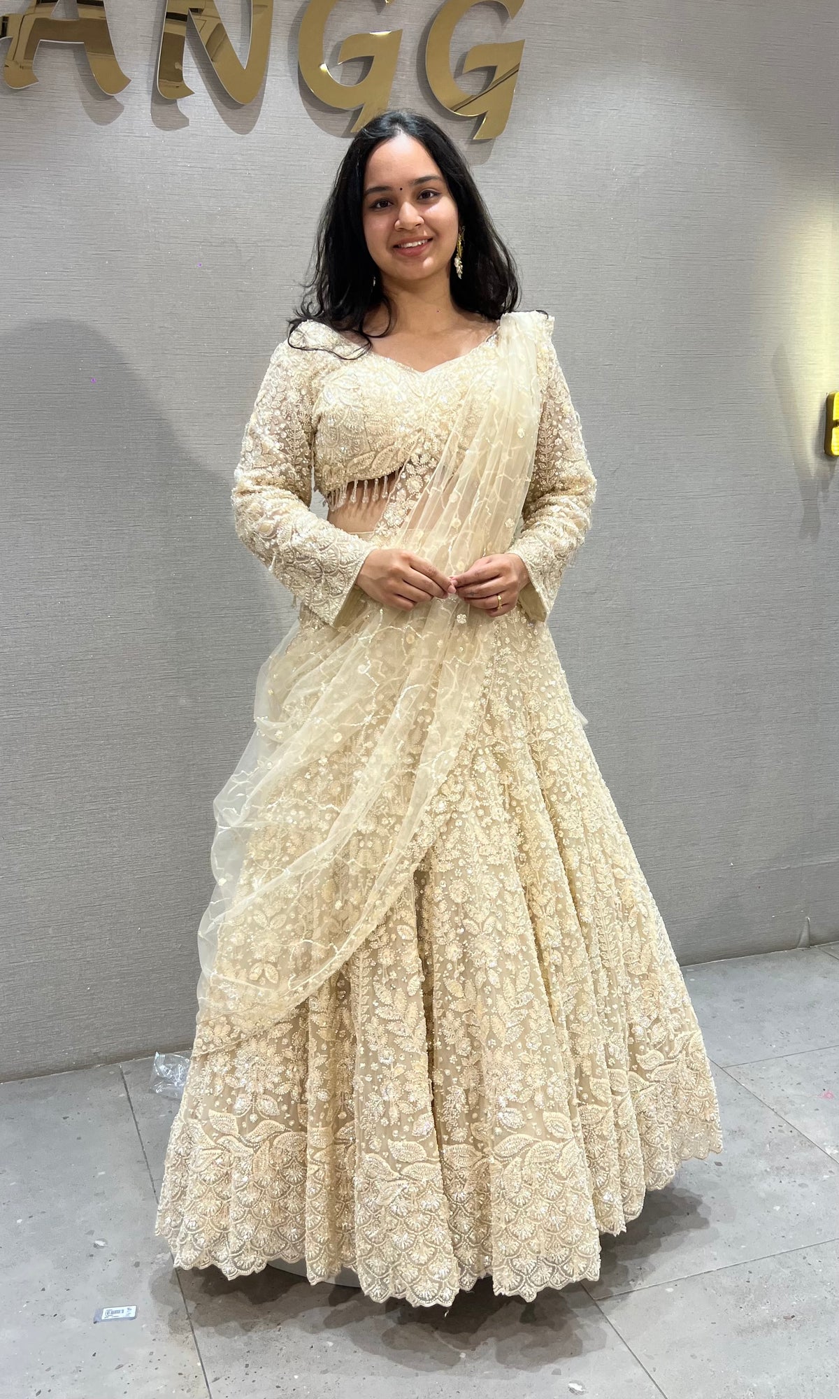 Cream soft net intricate floral Embroidery bridal lehenga