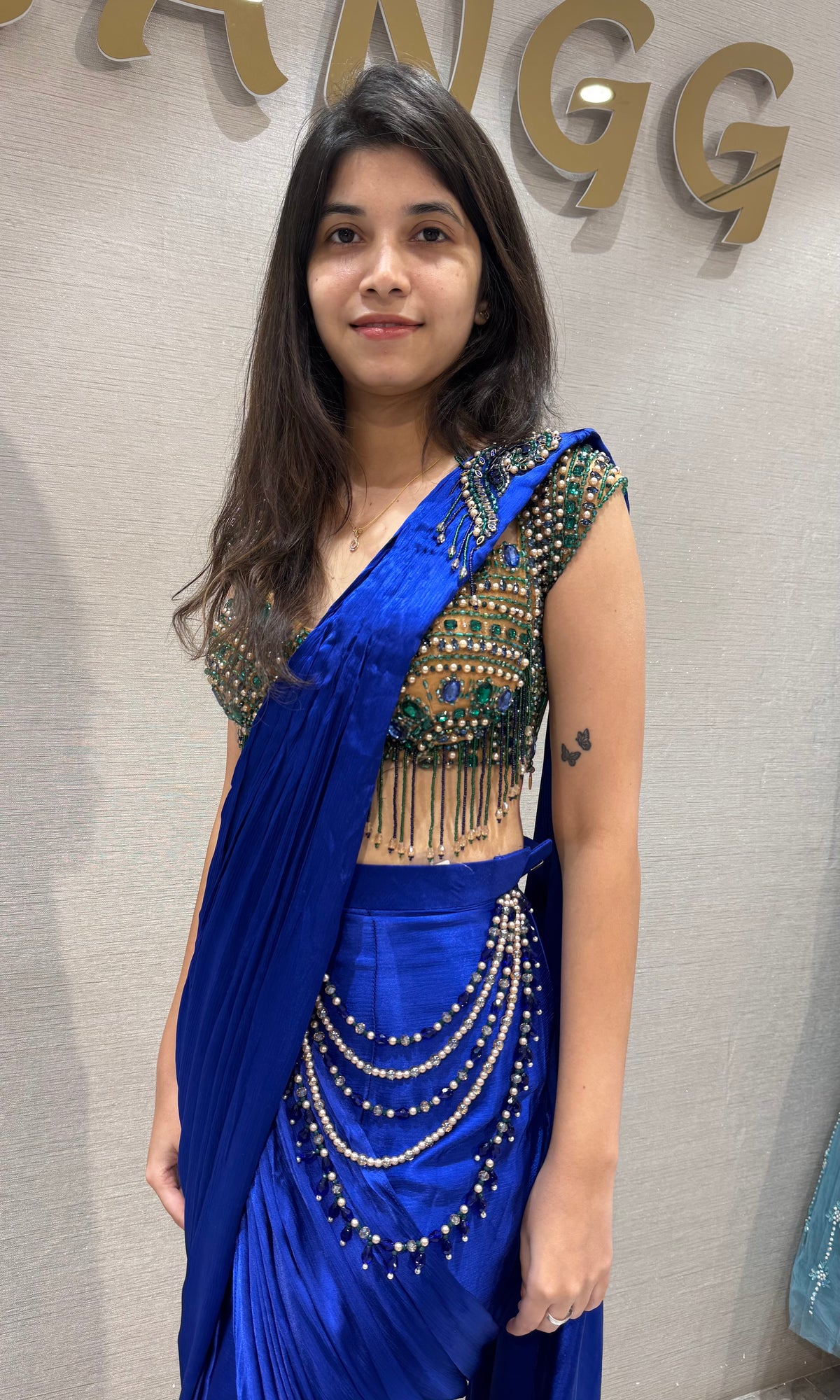 Royal Blue draped Satin Saree with Heavily Embellished Blouse