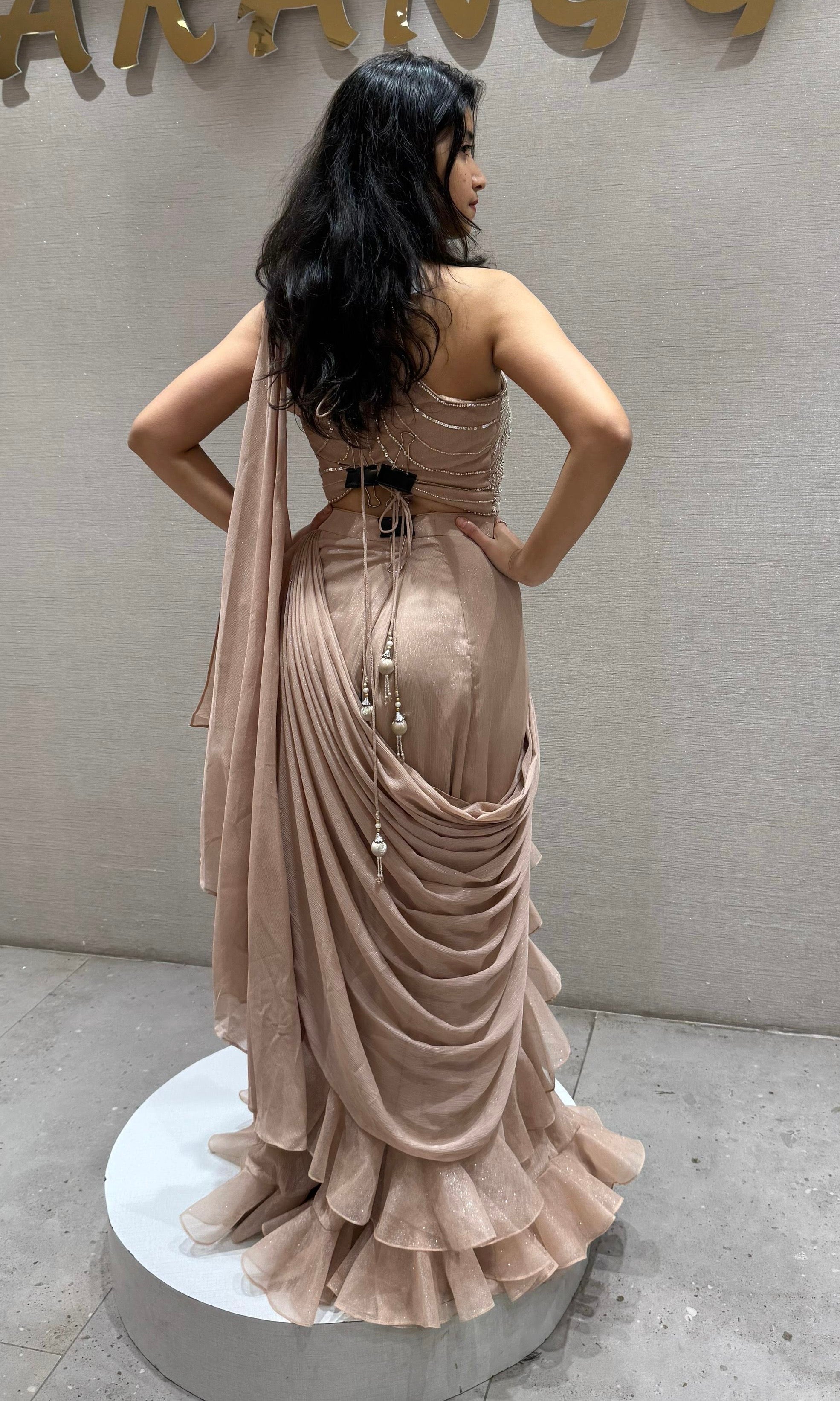 Beige Ruffle drape saree with Embellished blouse