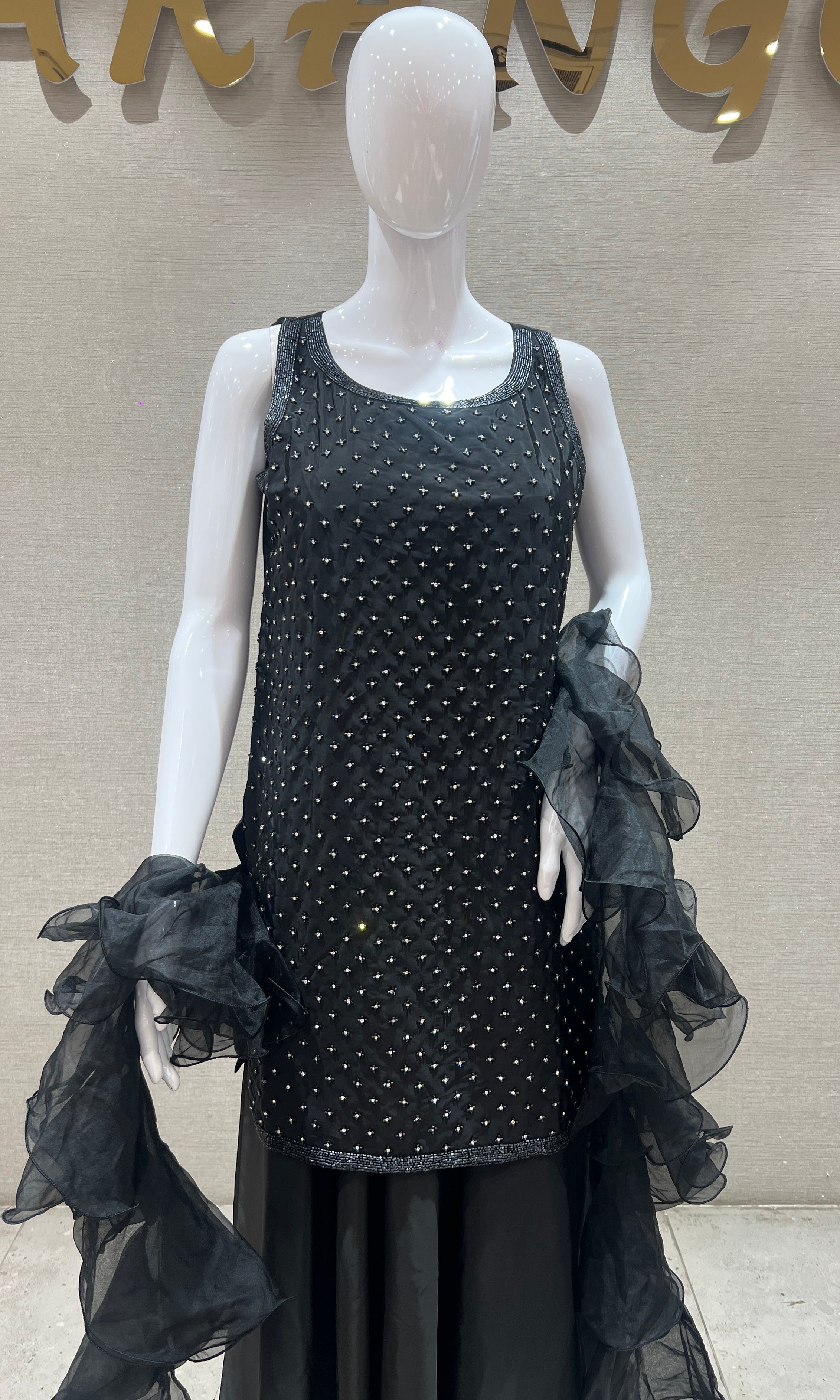 Black palazzo set with ruffle dupatta