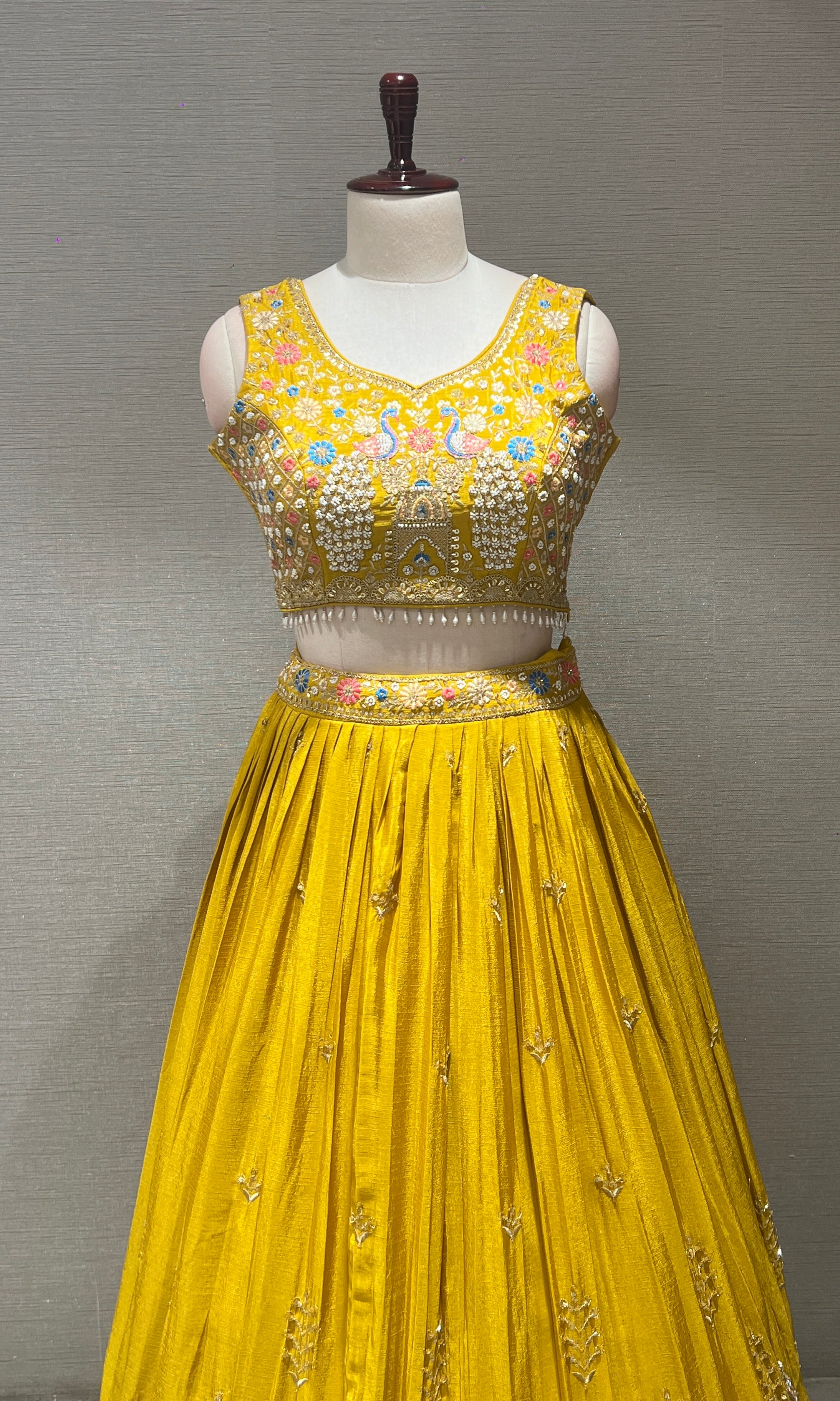 Yellow peacock embroidered Lehenga
