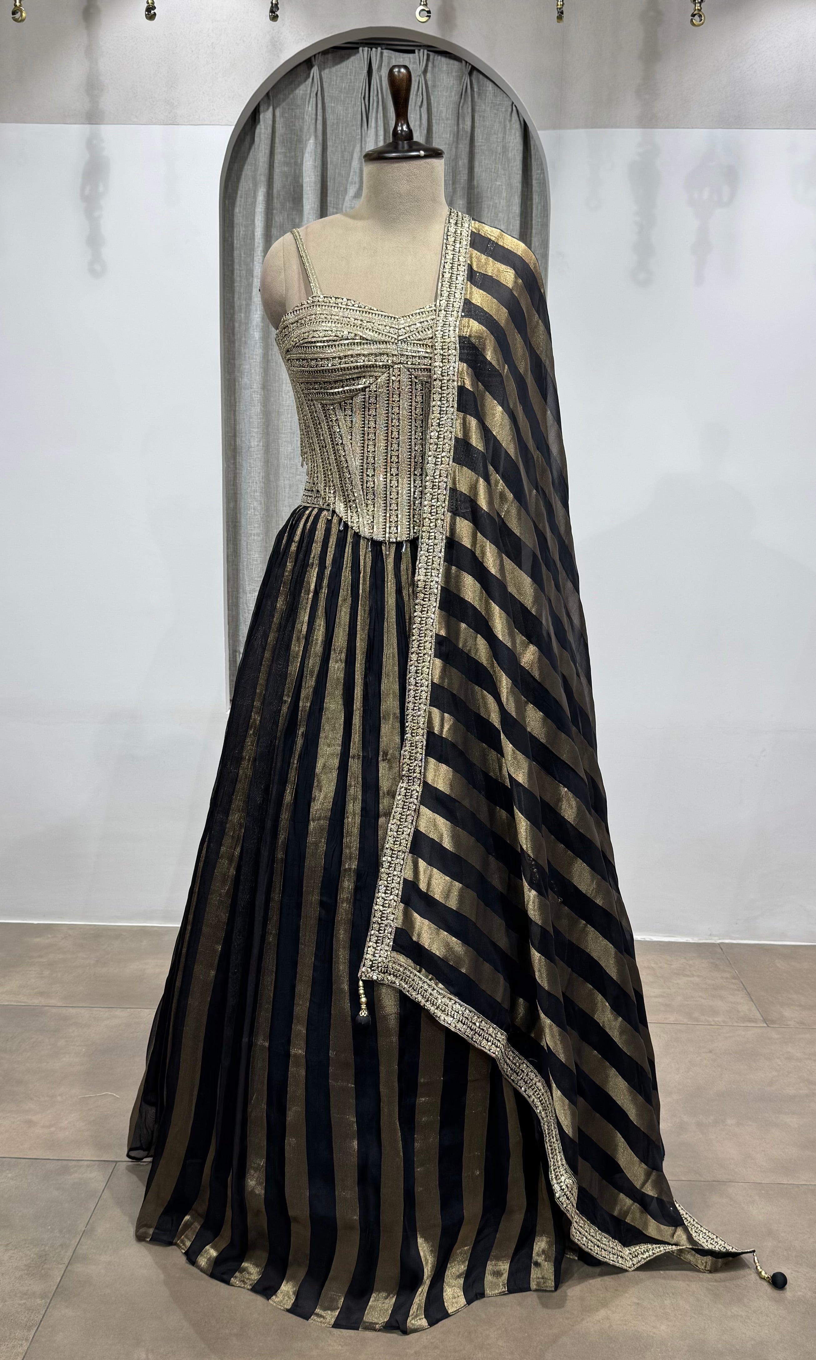 black and gold striped corset lehenga