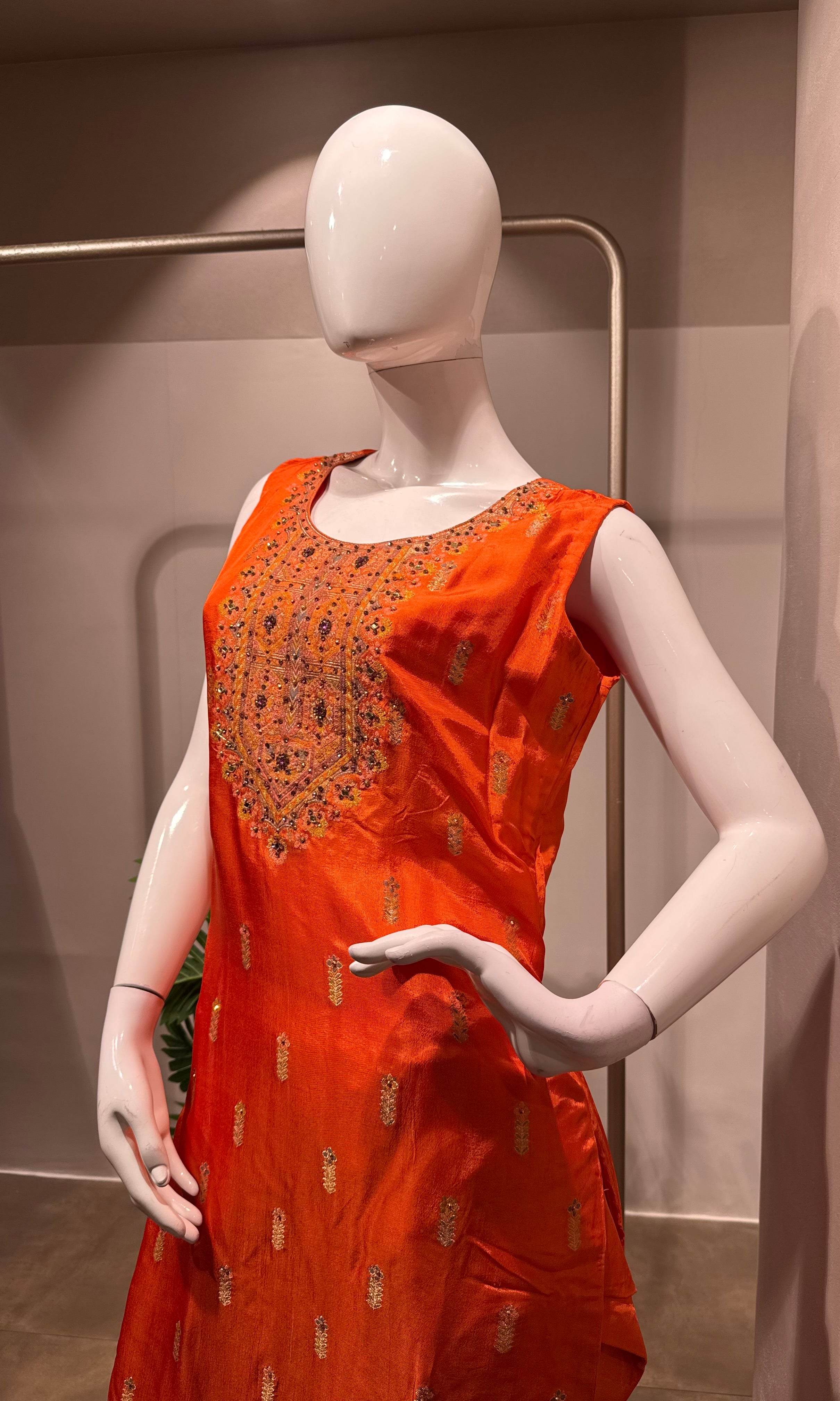 orange and gold embroidered kurta set