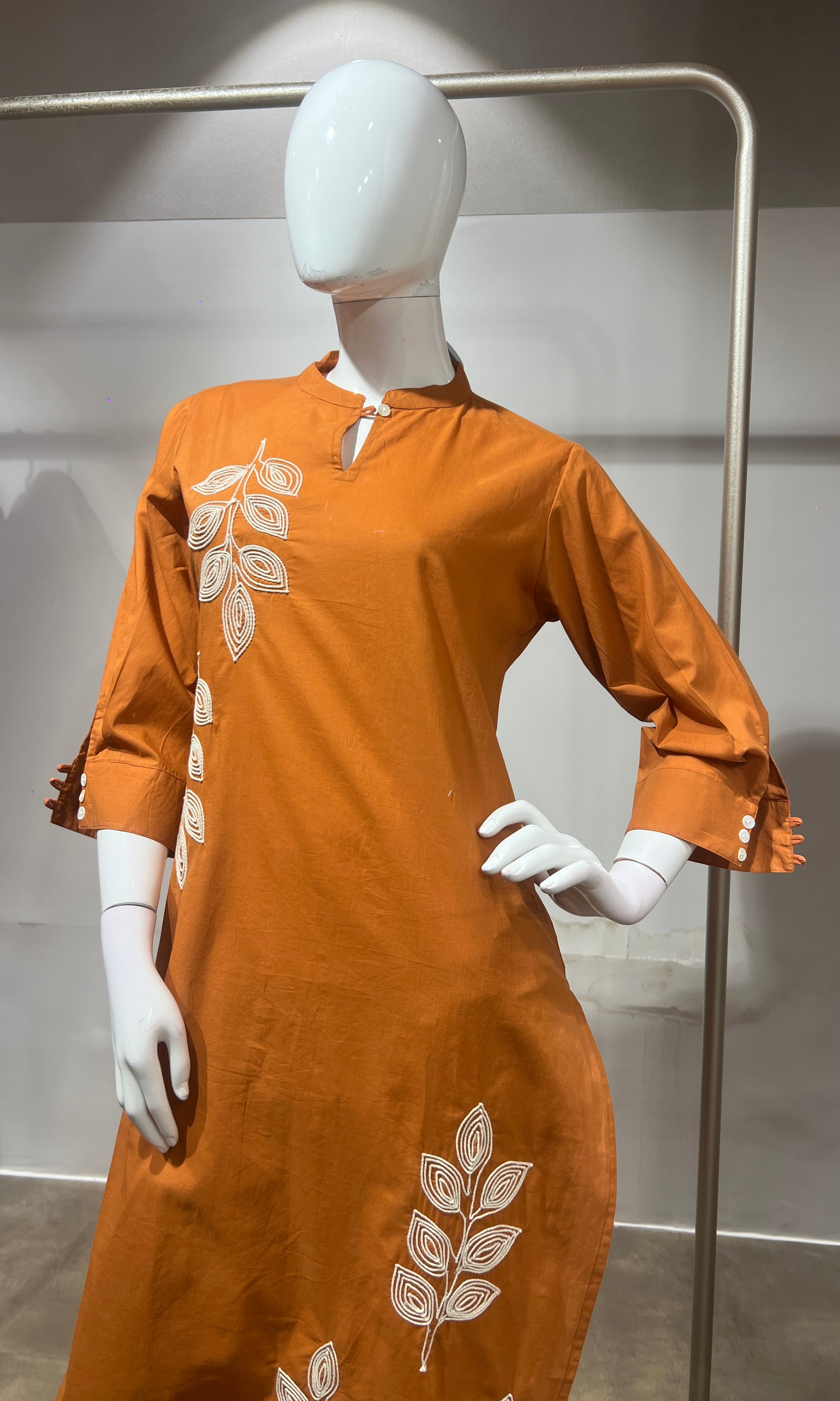 Orange leaf cotton kurta set with tassal dupatta