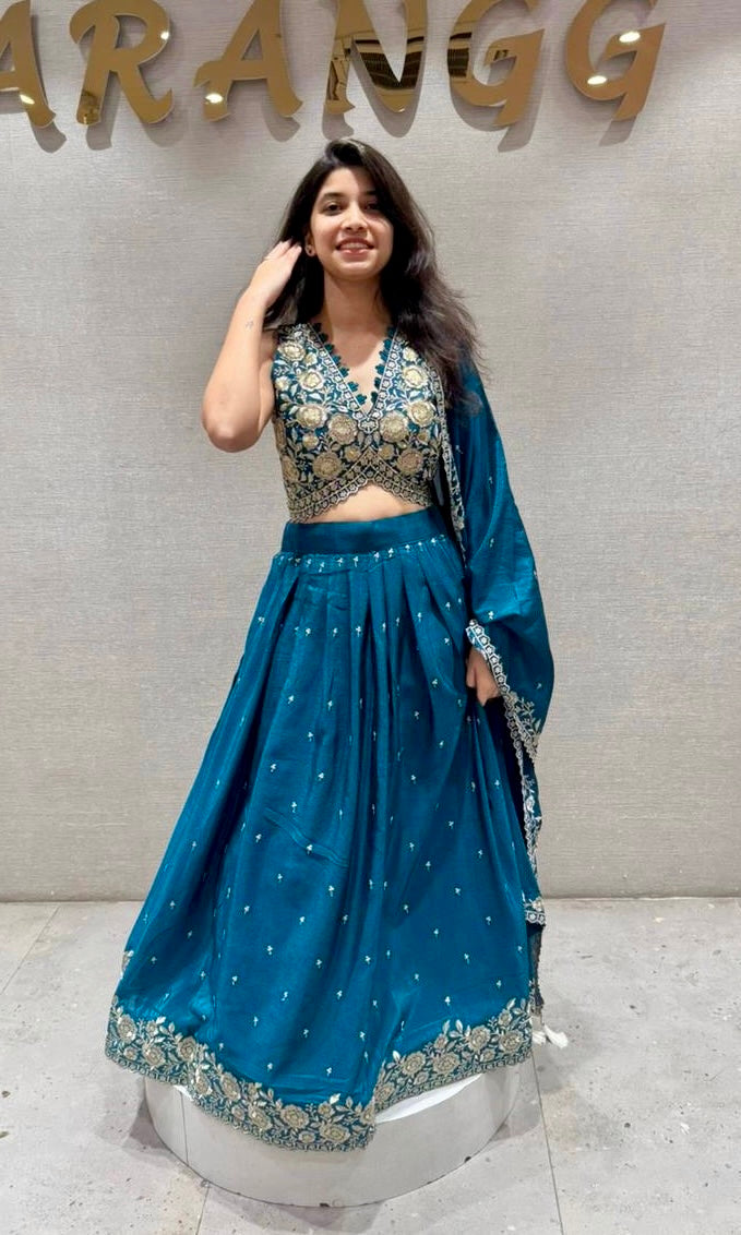 Peacock blue Lehenga with gold embroidery