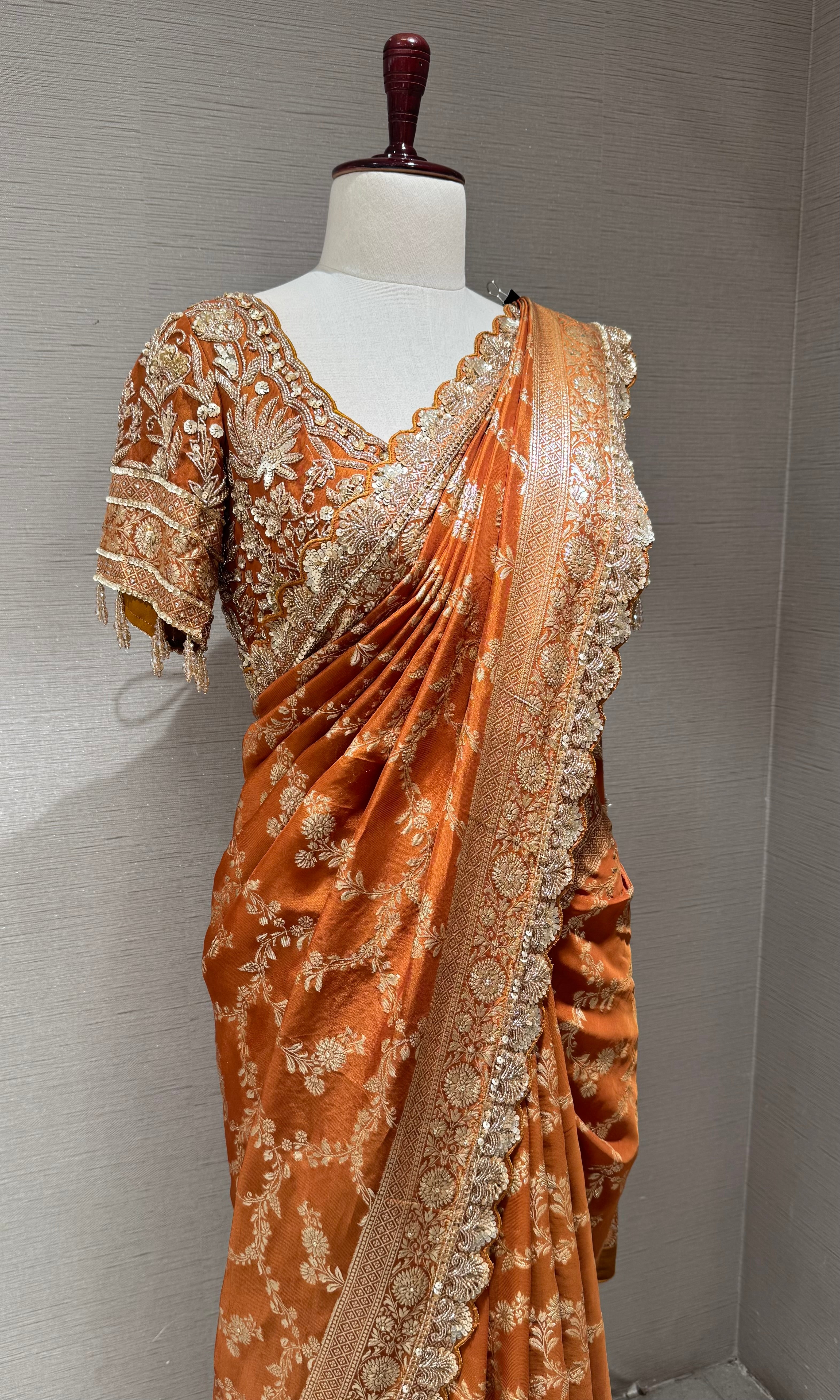 Brown designer saree with embroidered blouse
