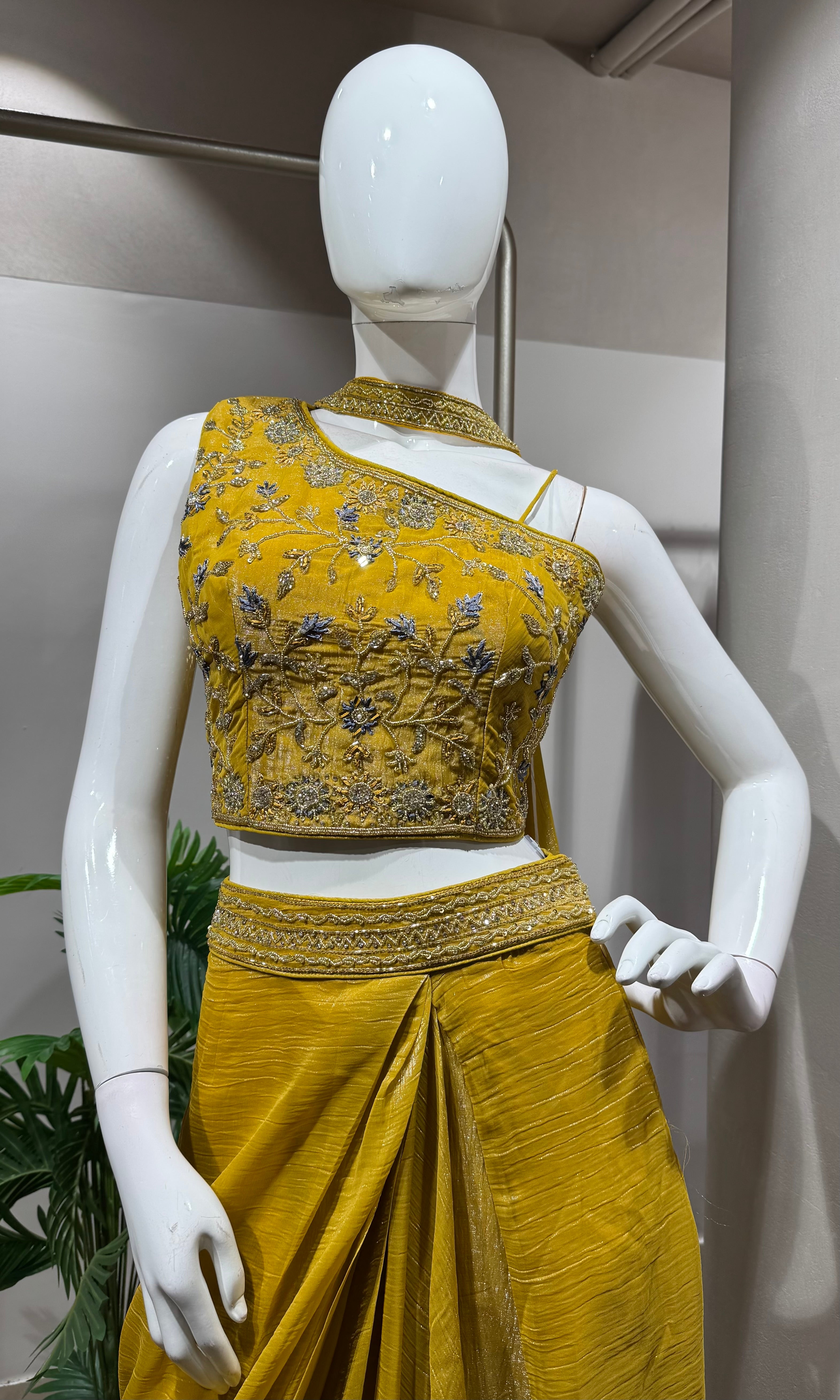 mustard draped skirt with embellished blouse