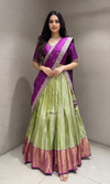 Purple and green banarasi pattu lehenga with embroidered blouse