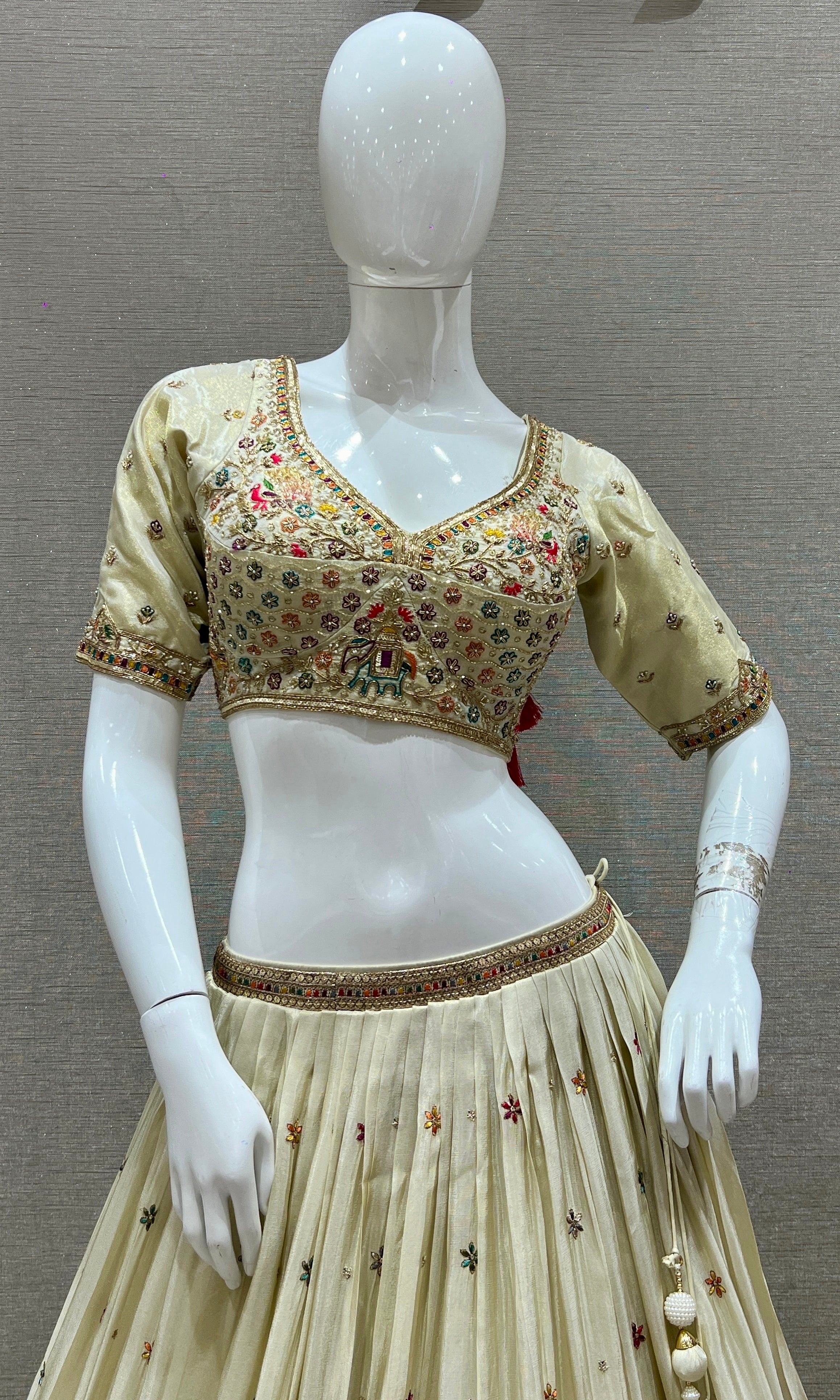 Vanika Vaatika – Cream Lehenga with Floral and Animal Embroidery Thread Work