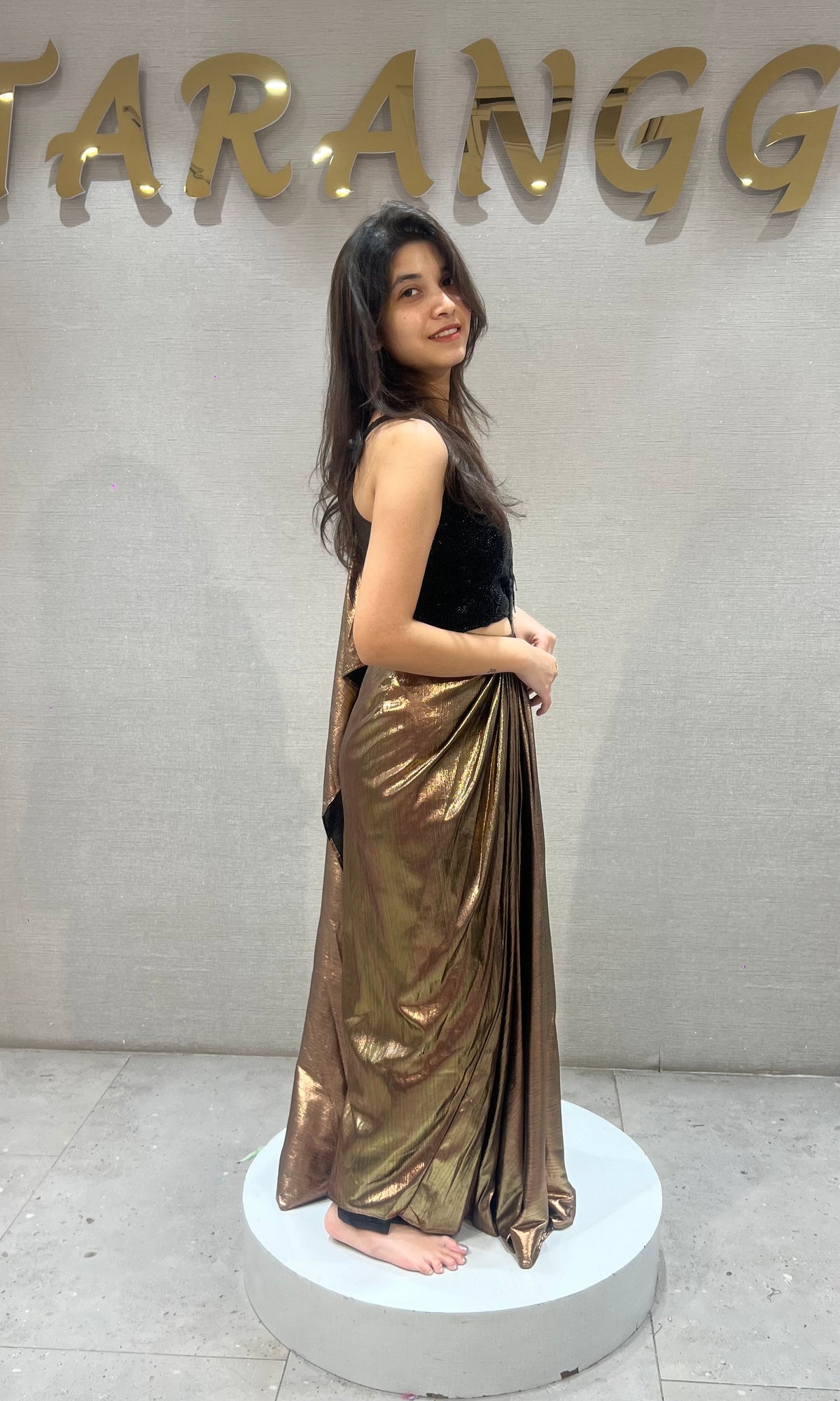 Metallic Brown Pleated Saree with Embroidered Black Blouse