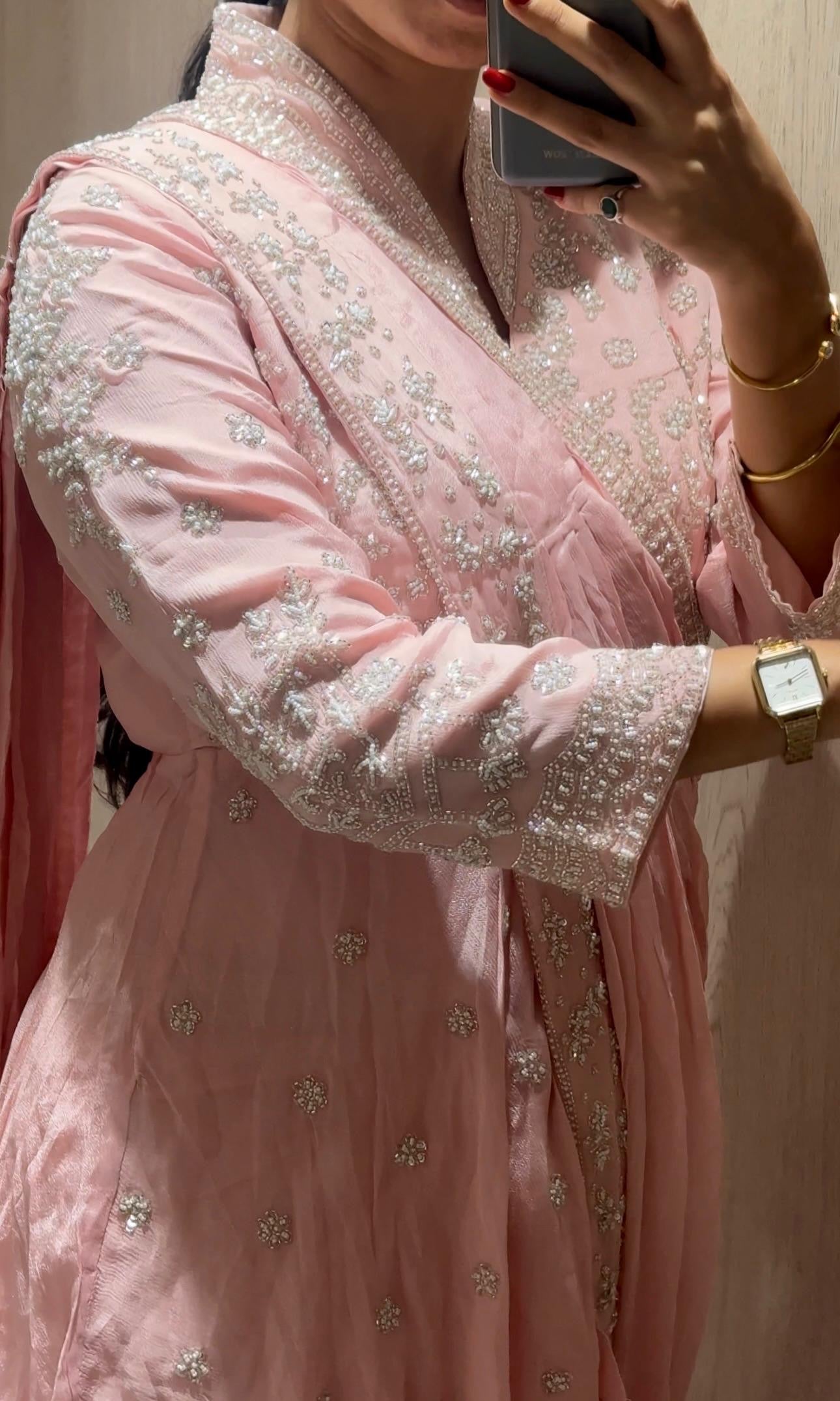 Pink pre drape saree with intricate stone work