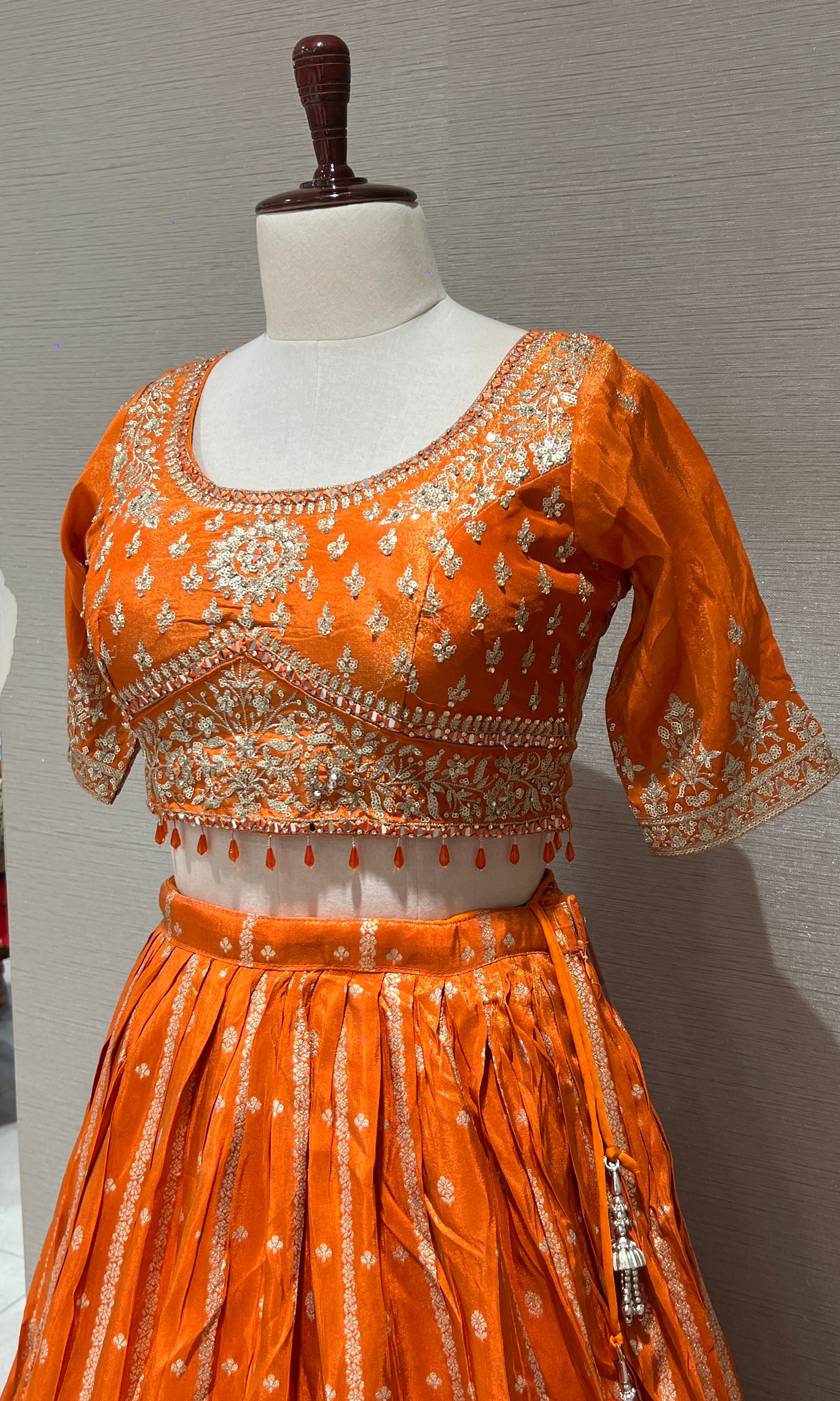 Orange Lehenga with Golden embroidery