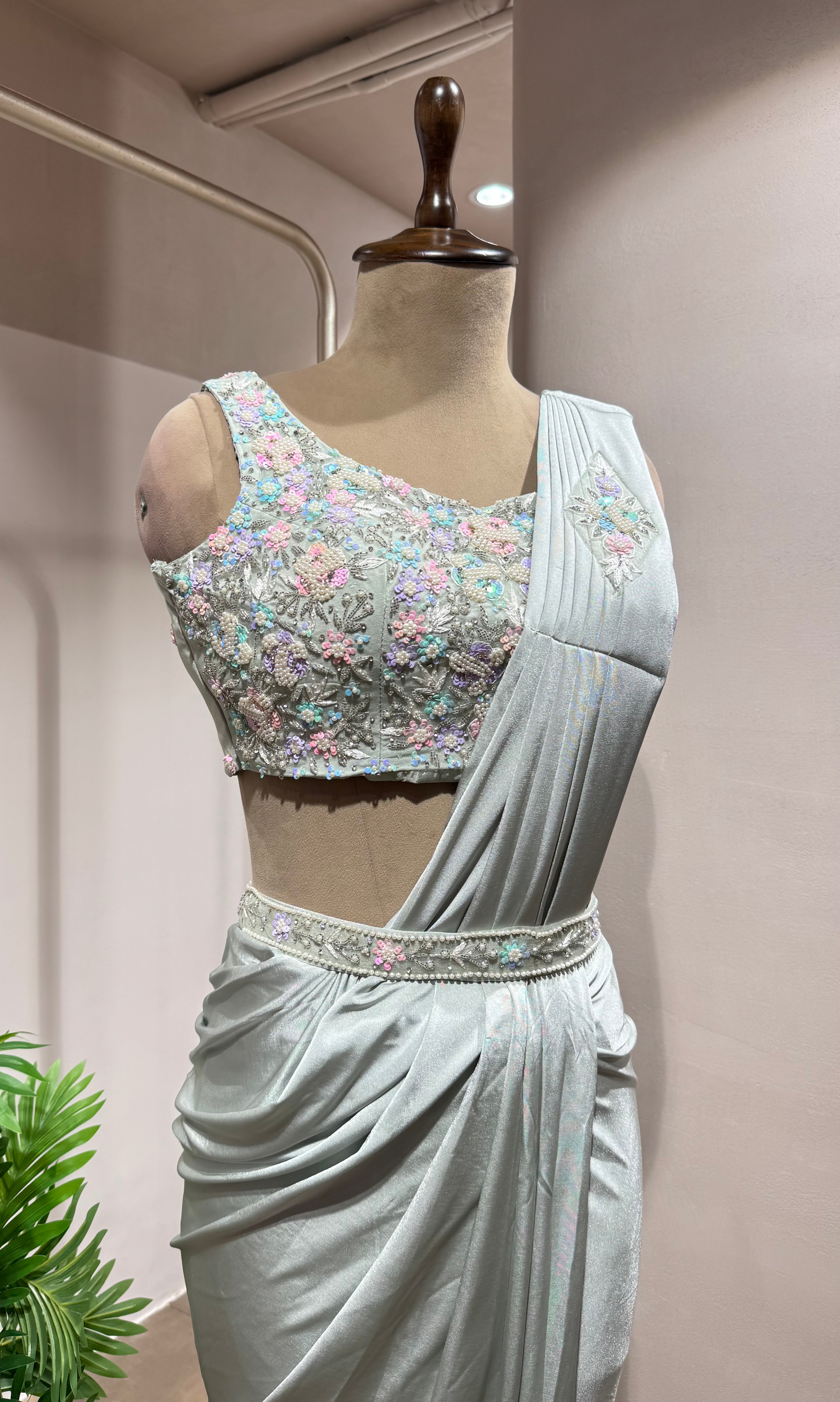 GREEN DRAPE SAREE WITH EMBELLISHED BLOUSE