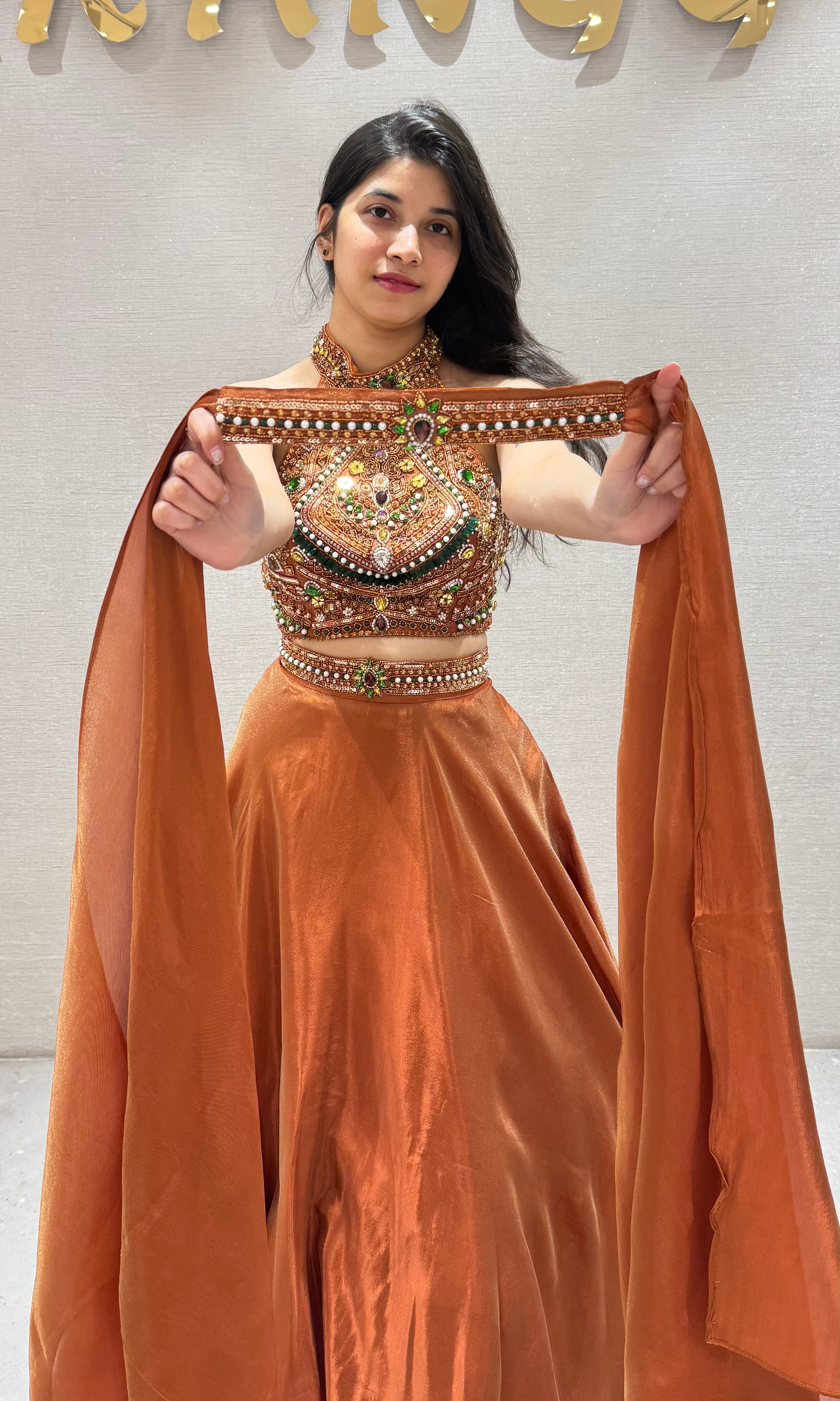 Rust Lehenga WITH HALTER NECK BLOUSE