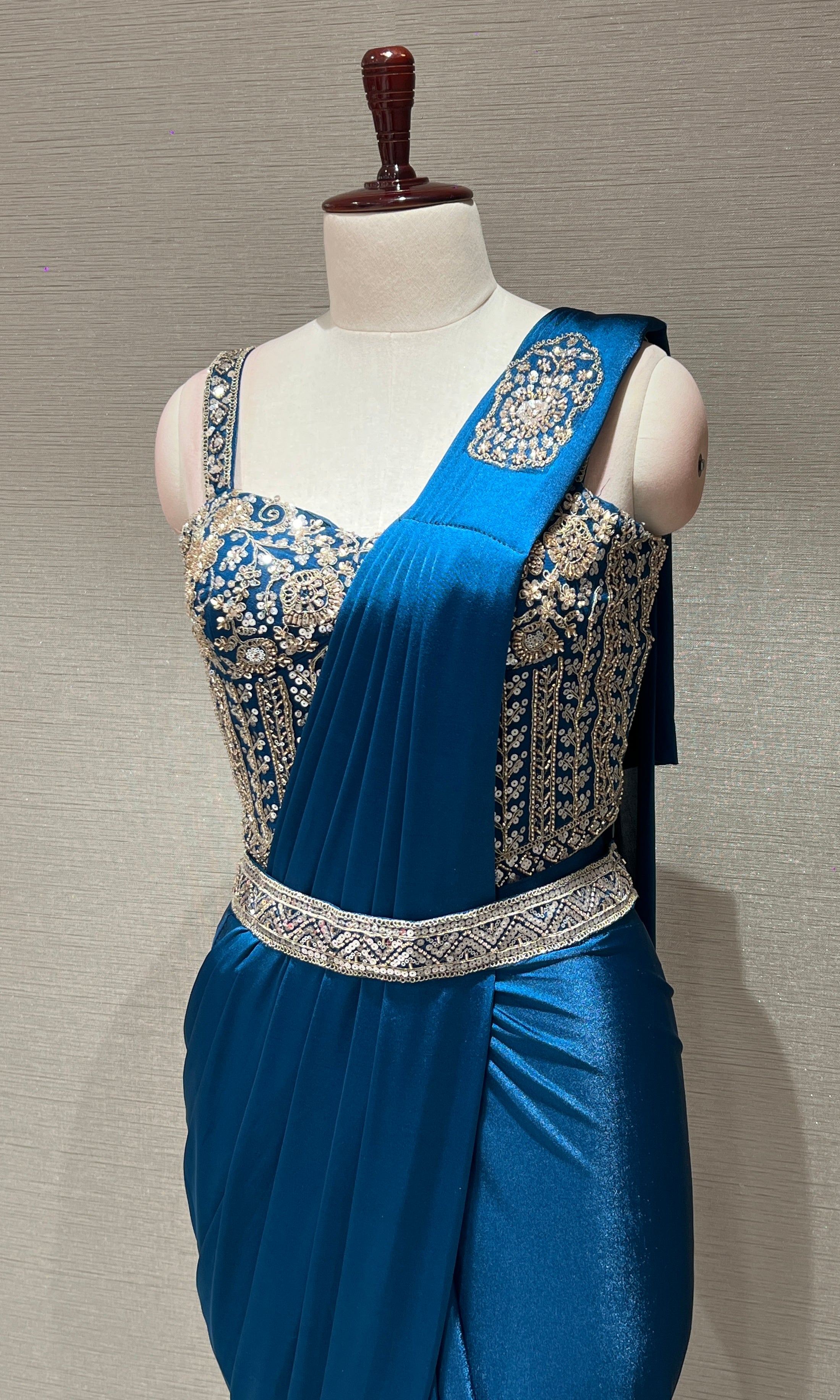 blue drape saree with corset blouse and belt