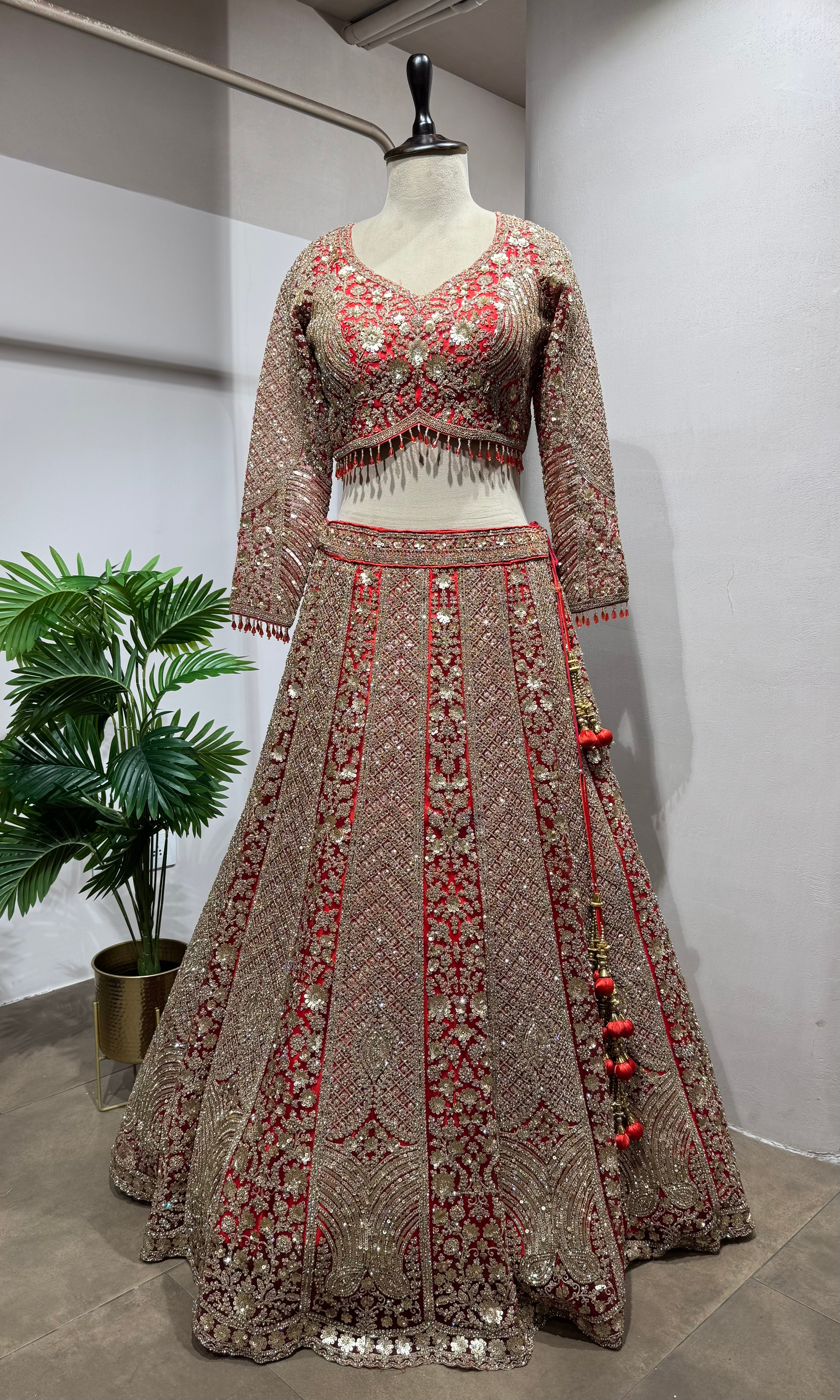 Red golden embroidery bridal lehenga