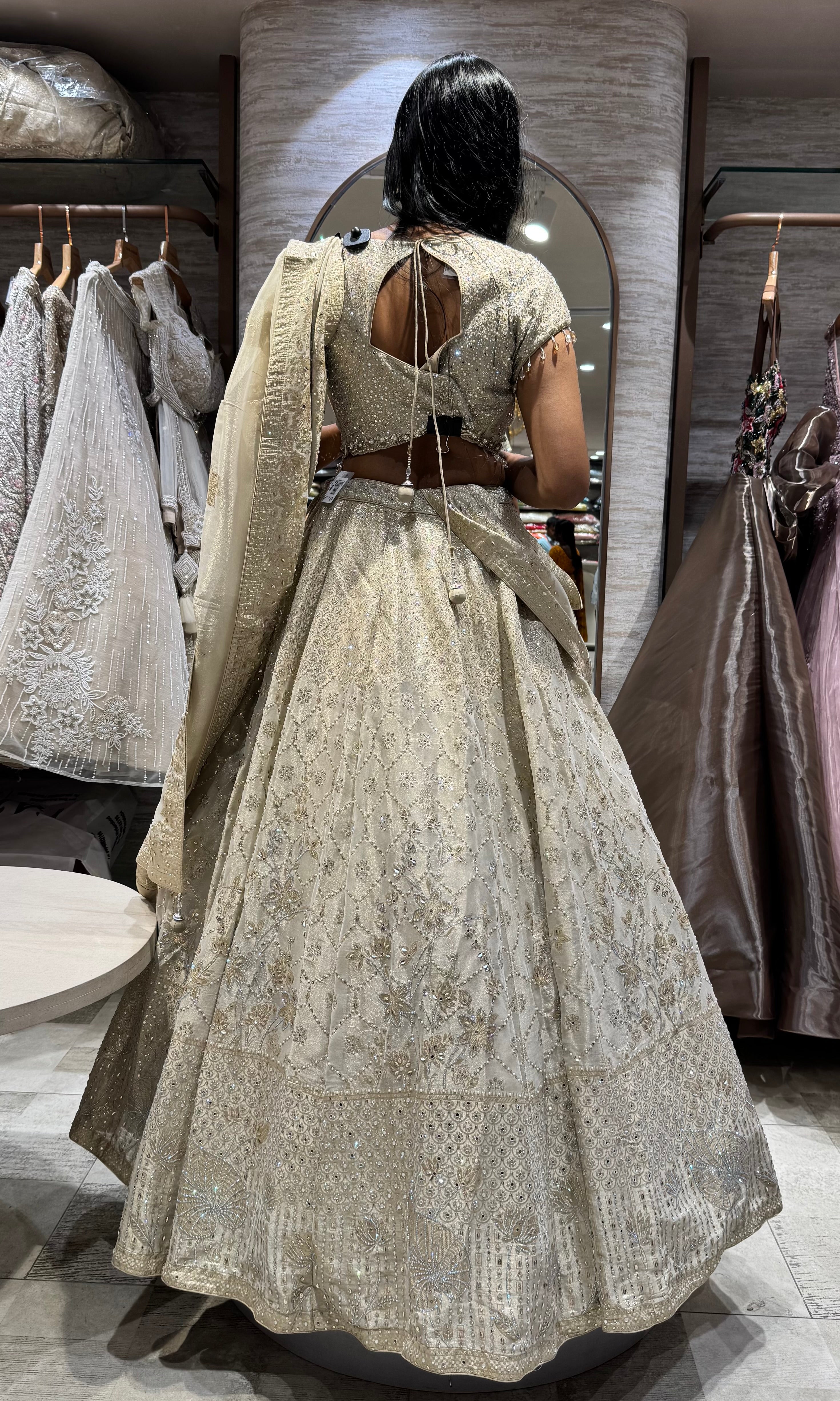 Gold intricate silver embroidery lehenga