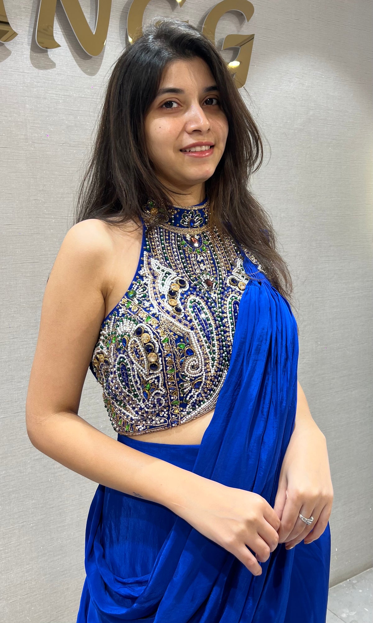 Royal blue draped saree with Crystals & Beadwork Halter blouse