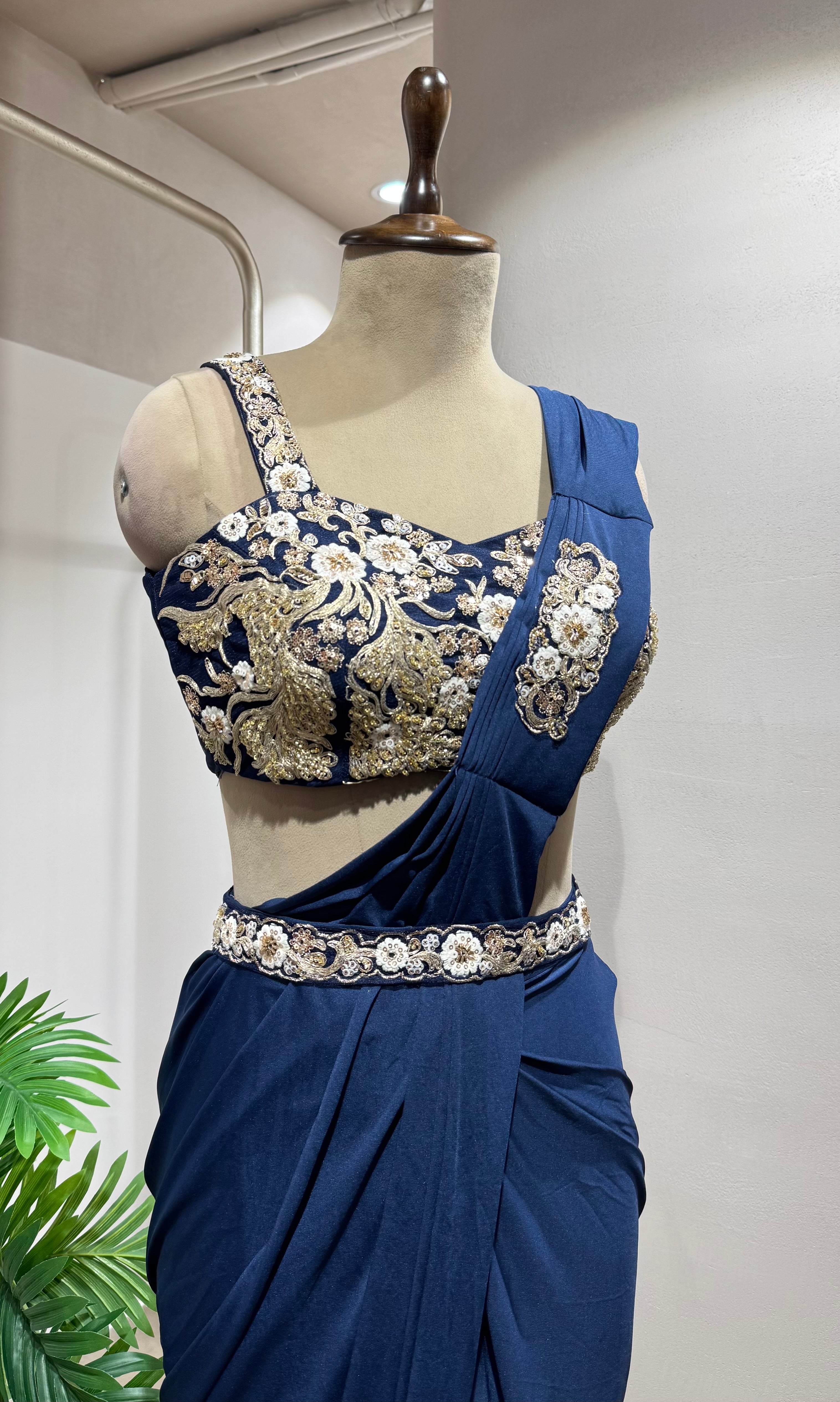 Blue draped saree with corset blouse