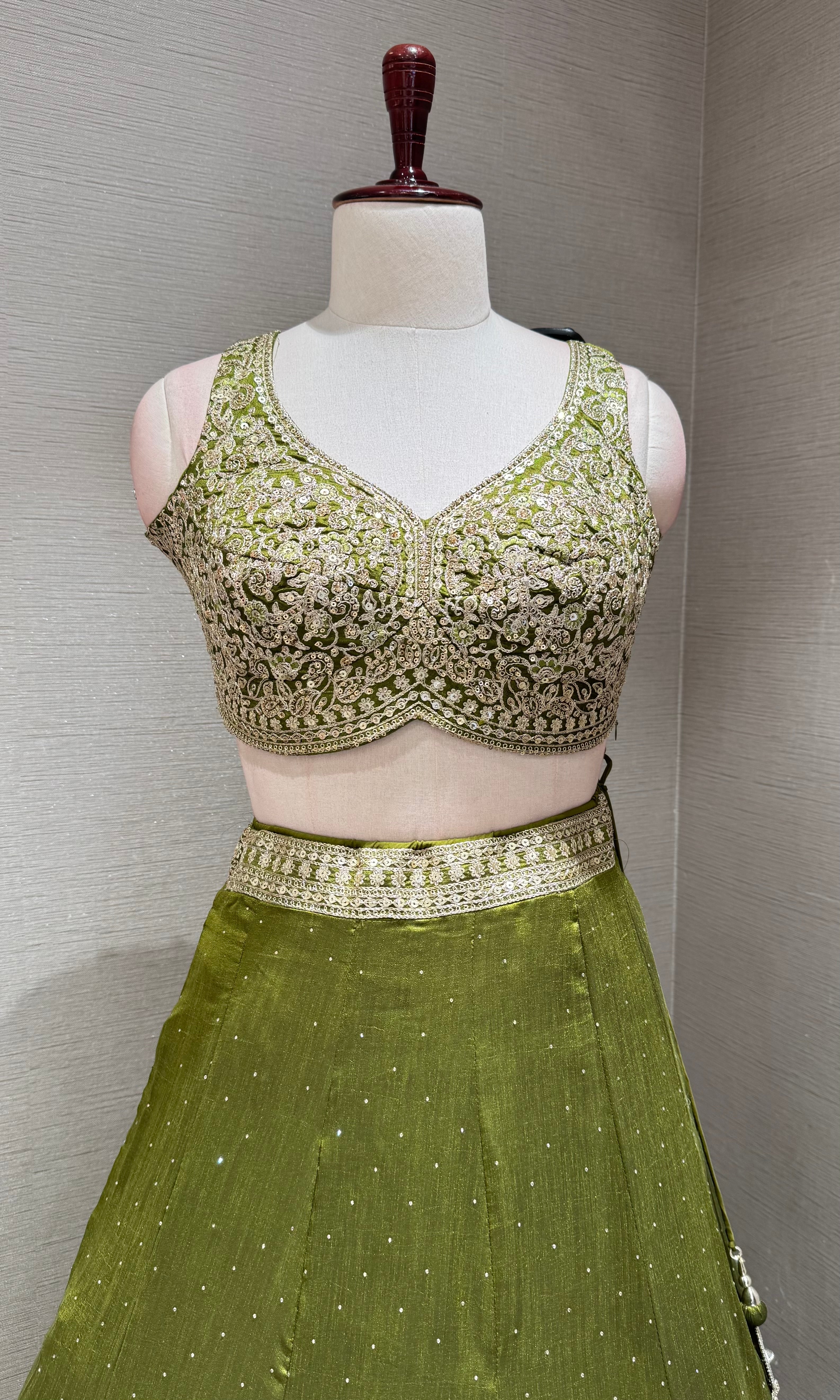 Green Lehenga Choli with Intricate Gold Embroidery