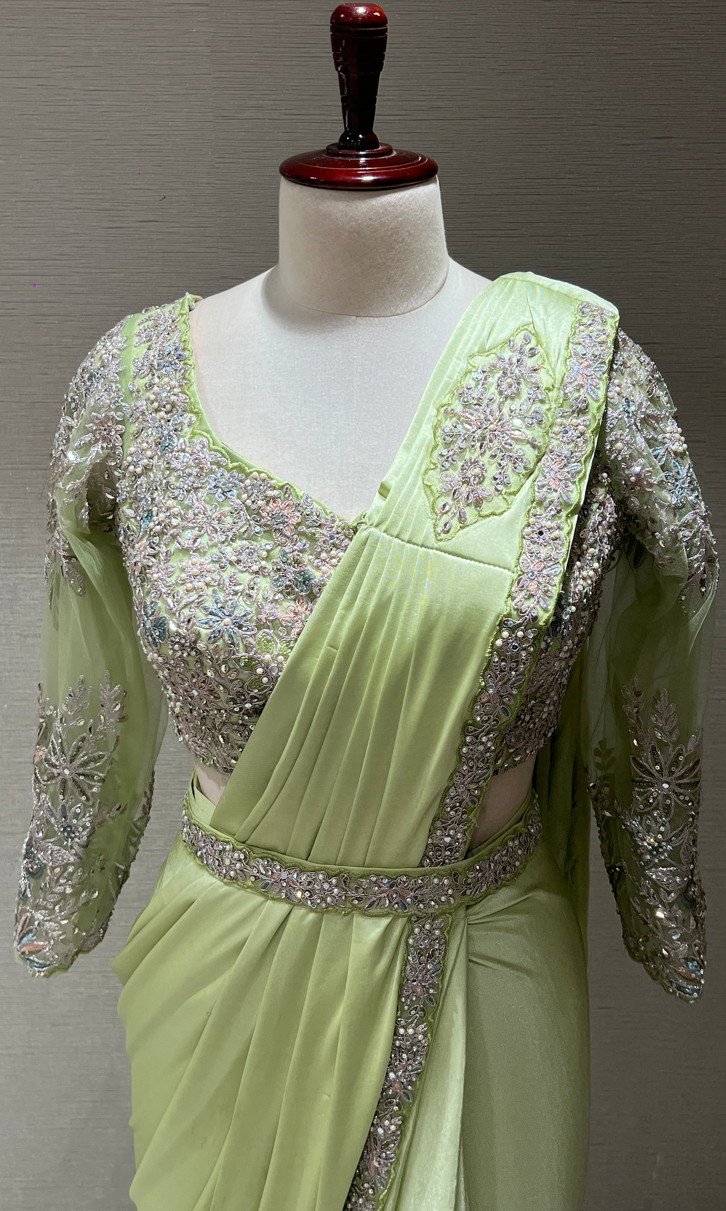 GREEN DRAPE SAREE WITH FLORAL BLOUSE & BELT