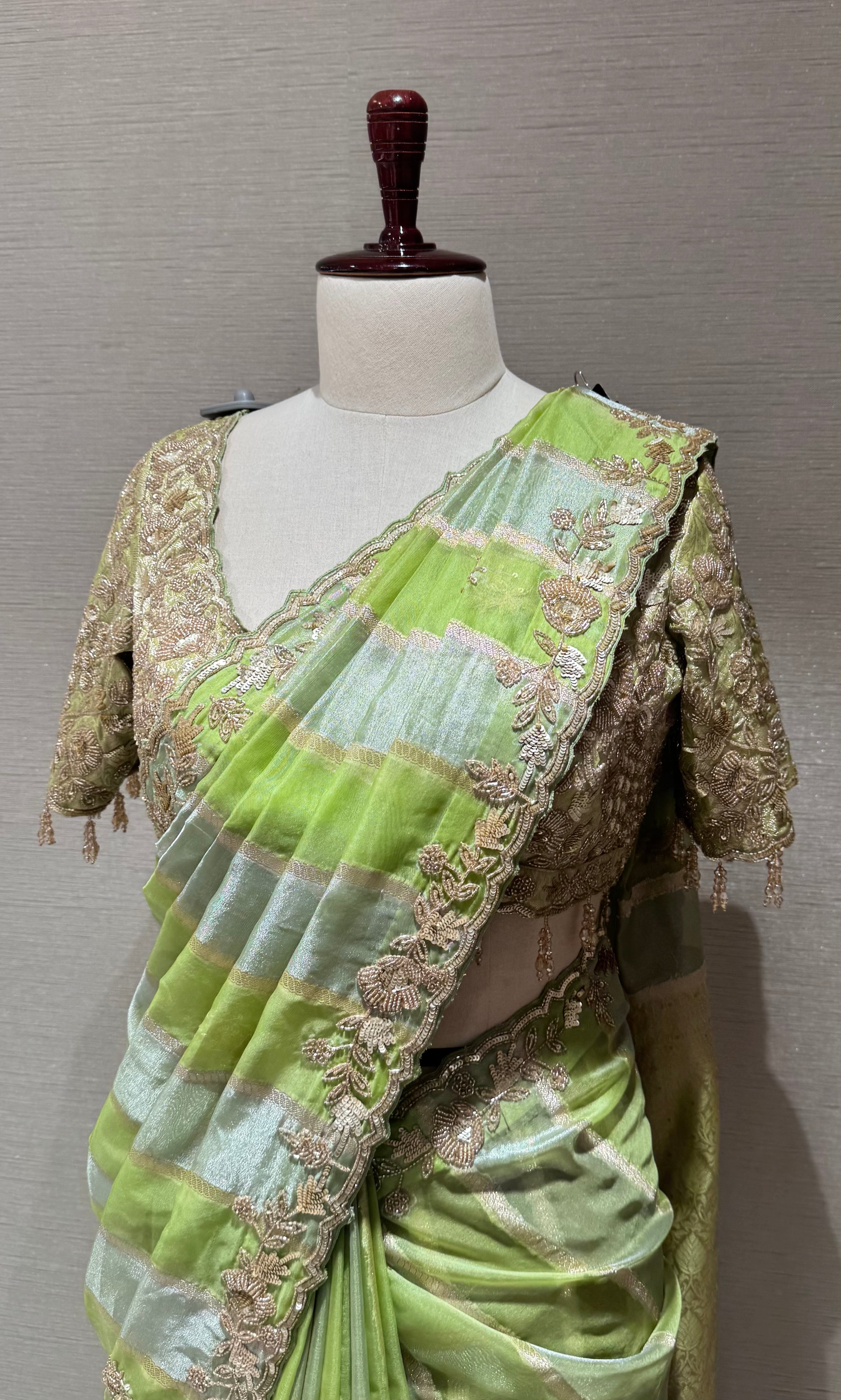 Green designer saree with embroidered blouse