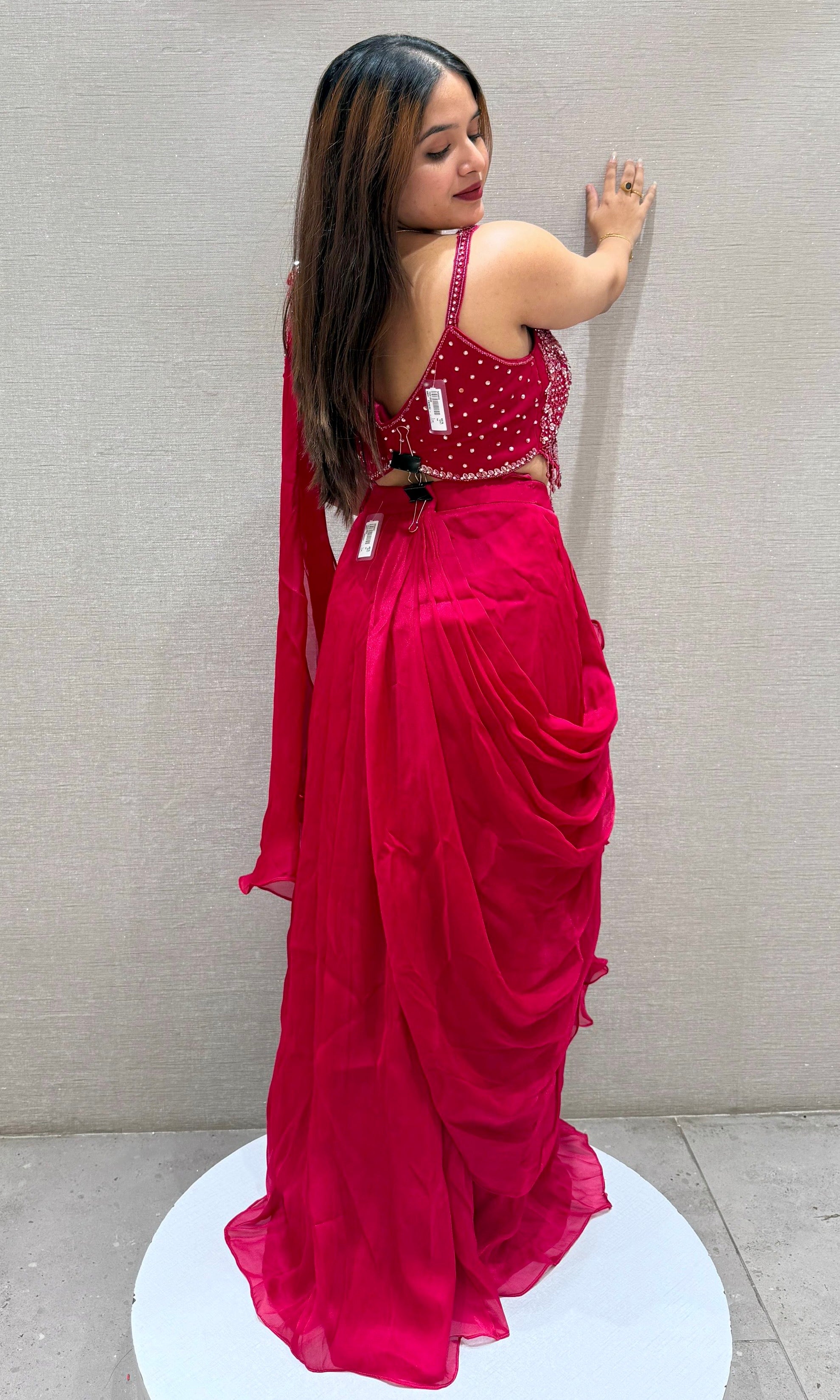 Red drape saree with embellished blouse
