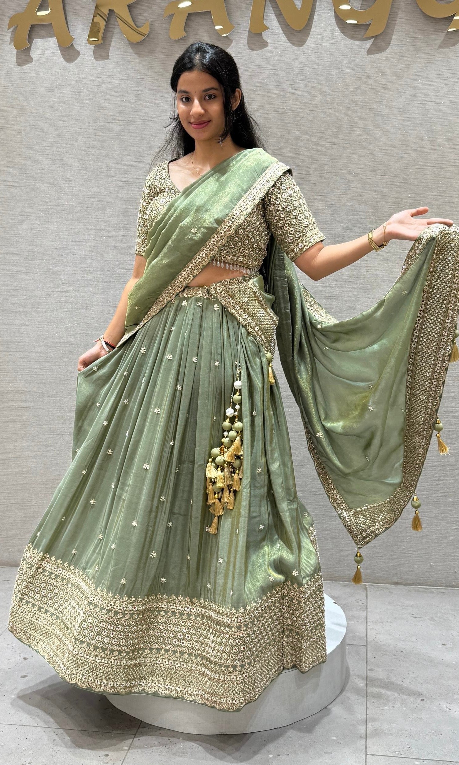 Vanika Sitara - Sage Green Lehenga with Floral & Gold Thread Work Embellishments