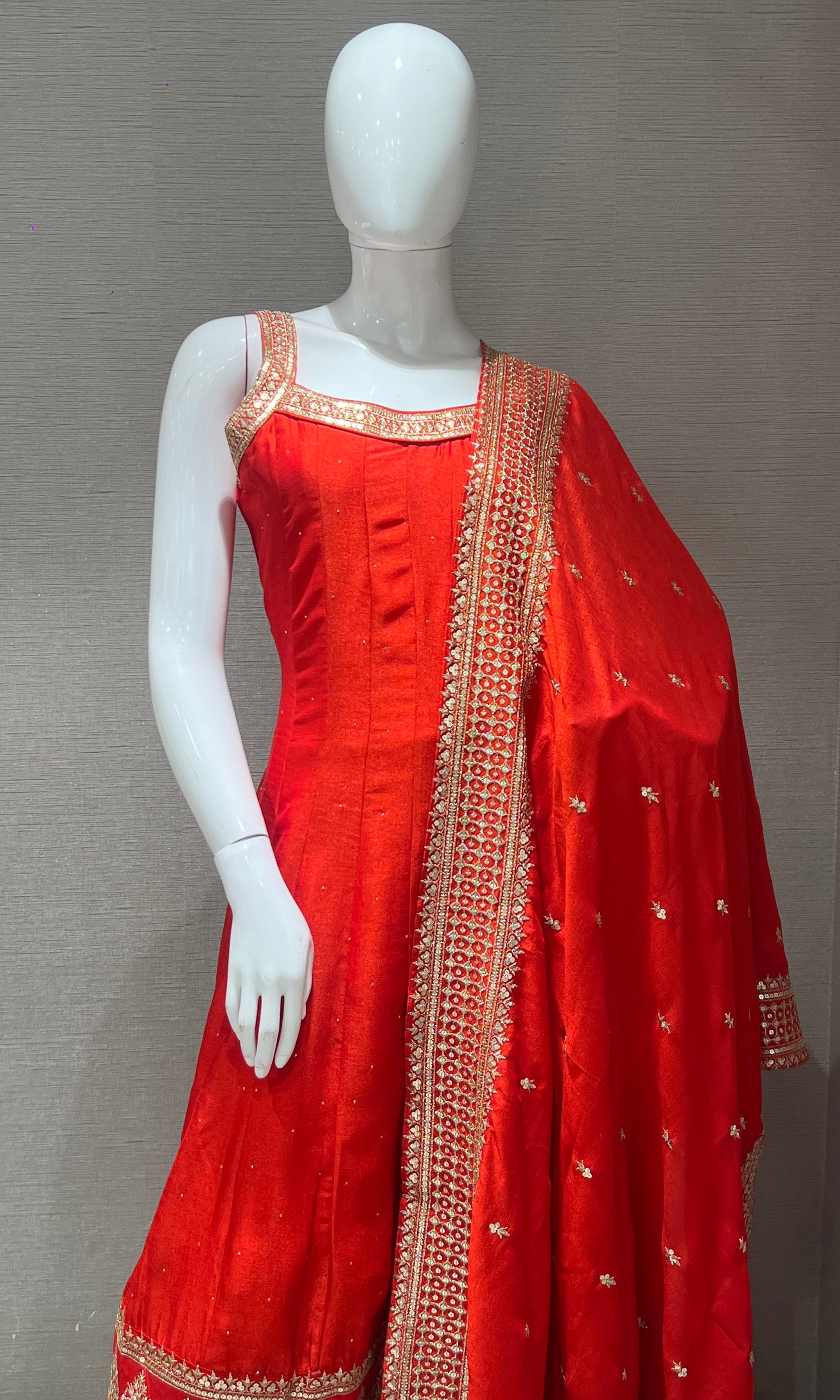 Orange anarkali set with gold embroidery