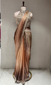 Brown saree with Embellished halter neck blouse