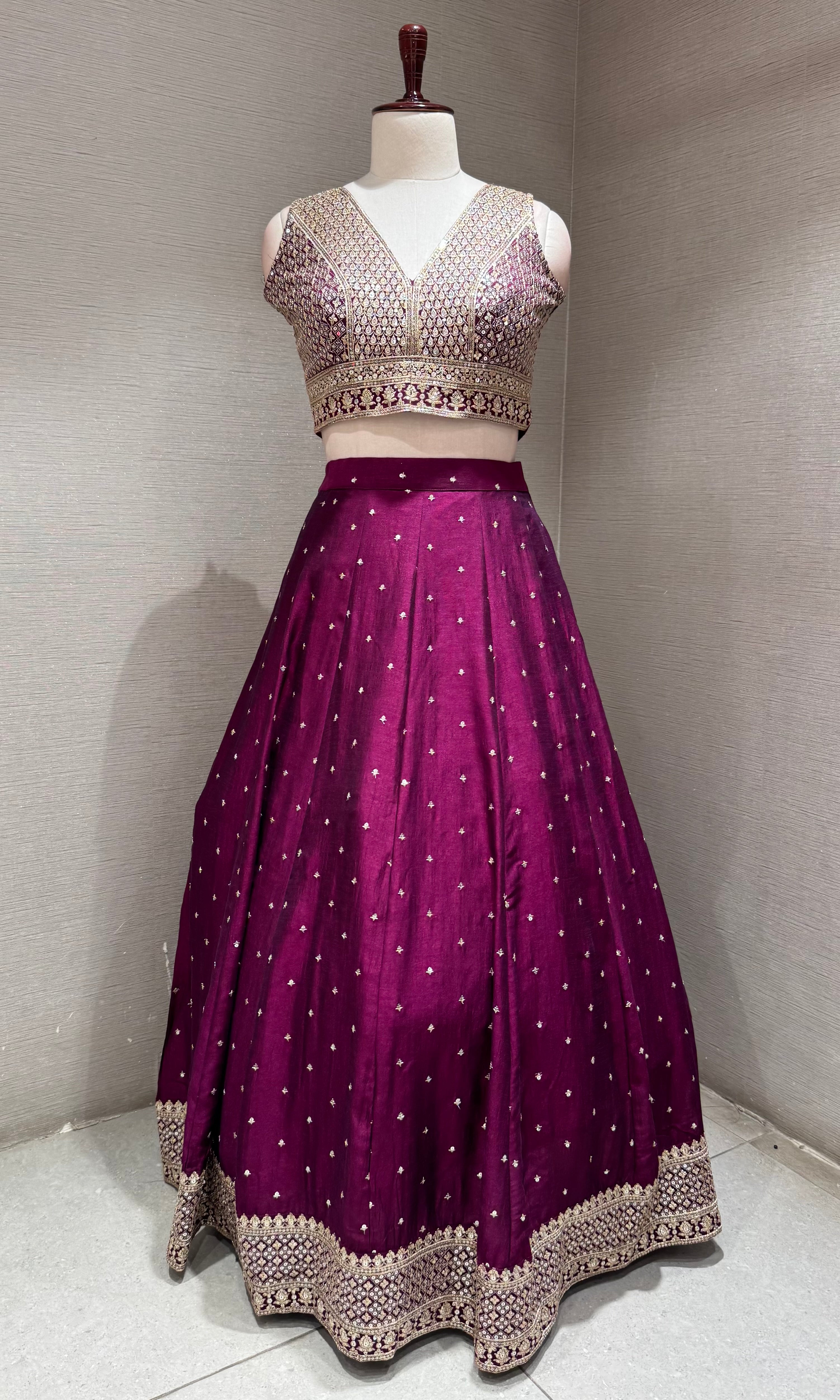 Wine and gold embroidered Lehenga Choli