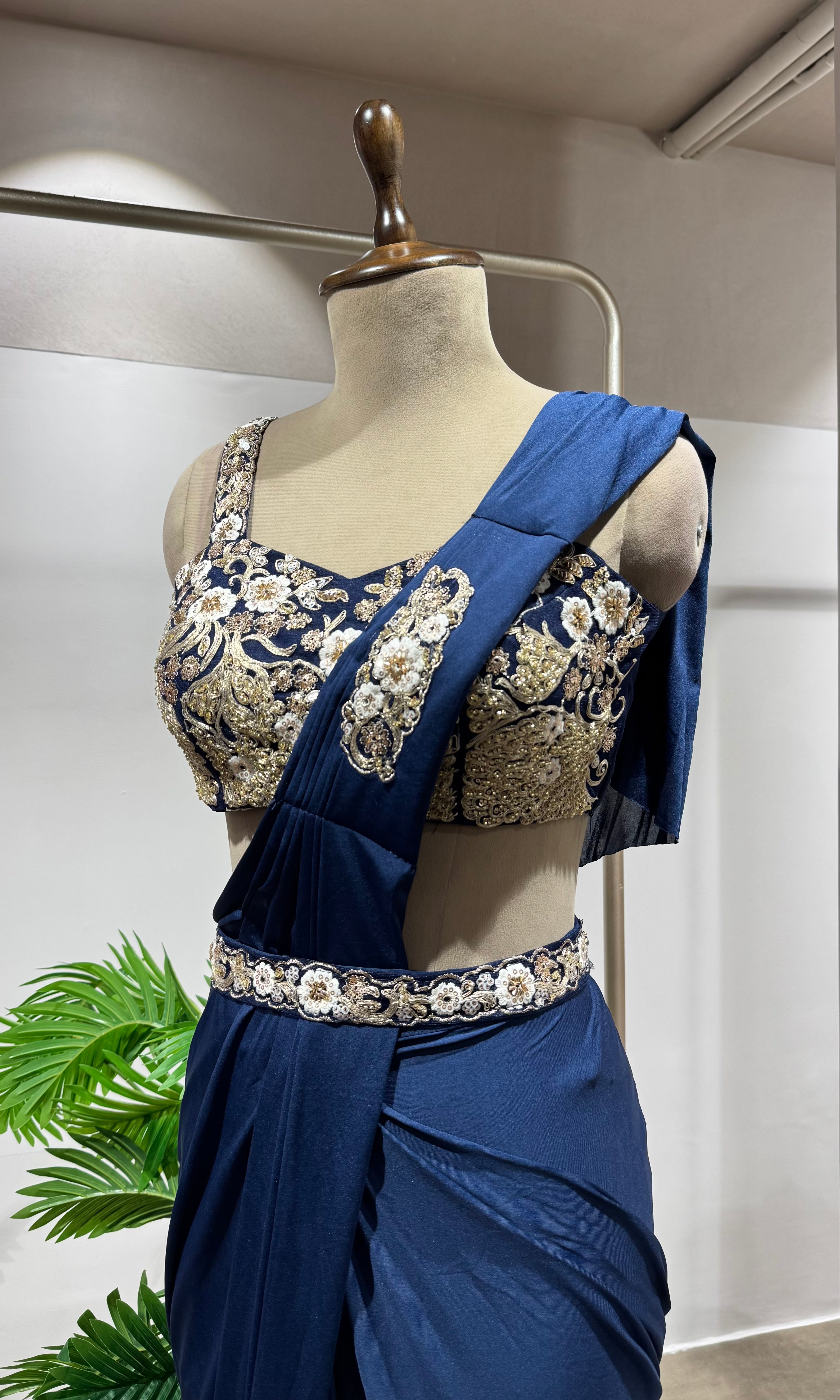 Blue draped saree with corset blouse
