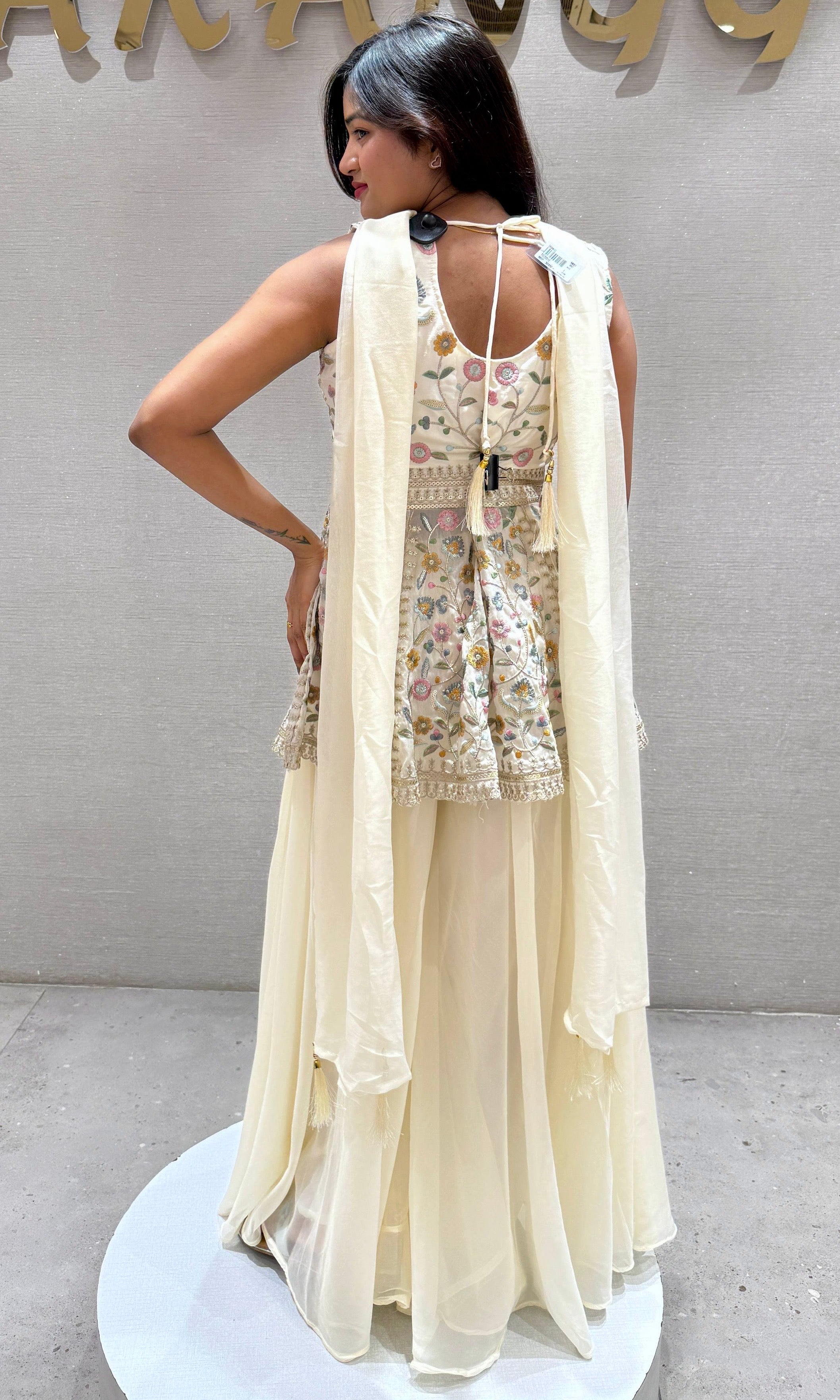 White palazzo with peplum