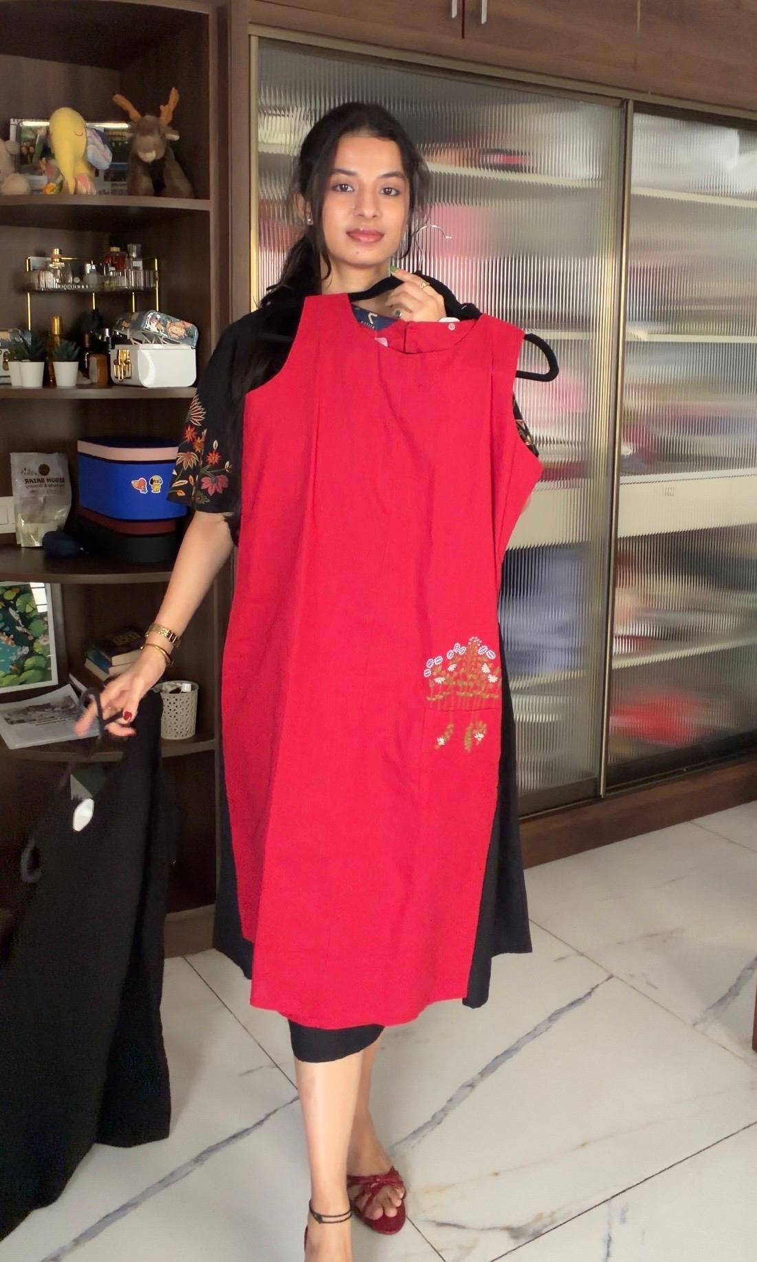 Red dress with floral embroidery on the pocket