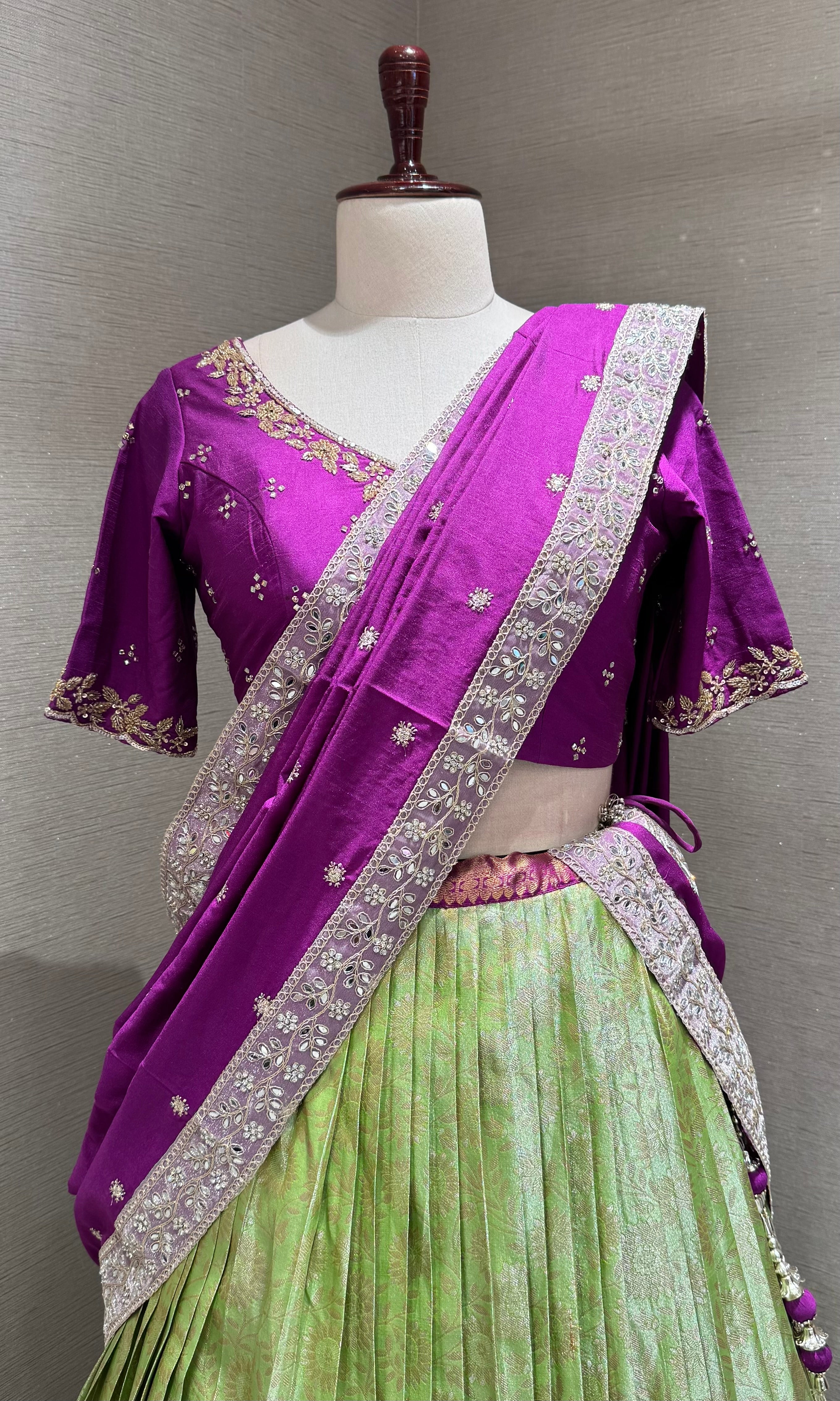 Purple and green banarasi pattu lehenga with embroidered blouse