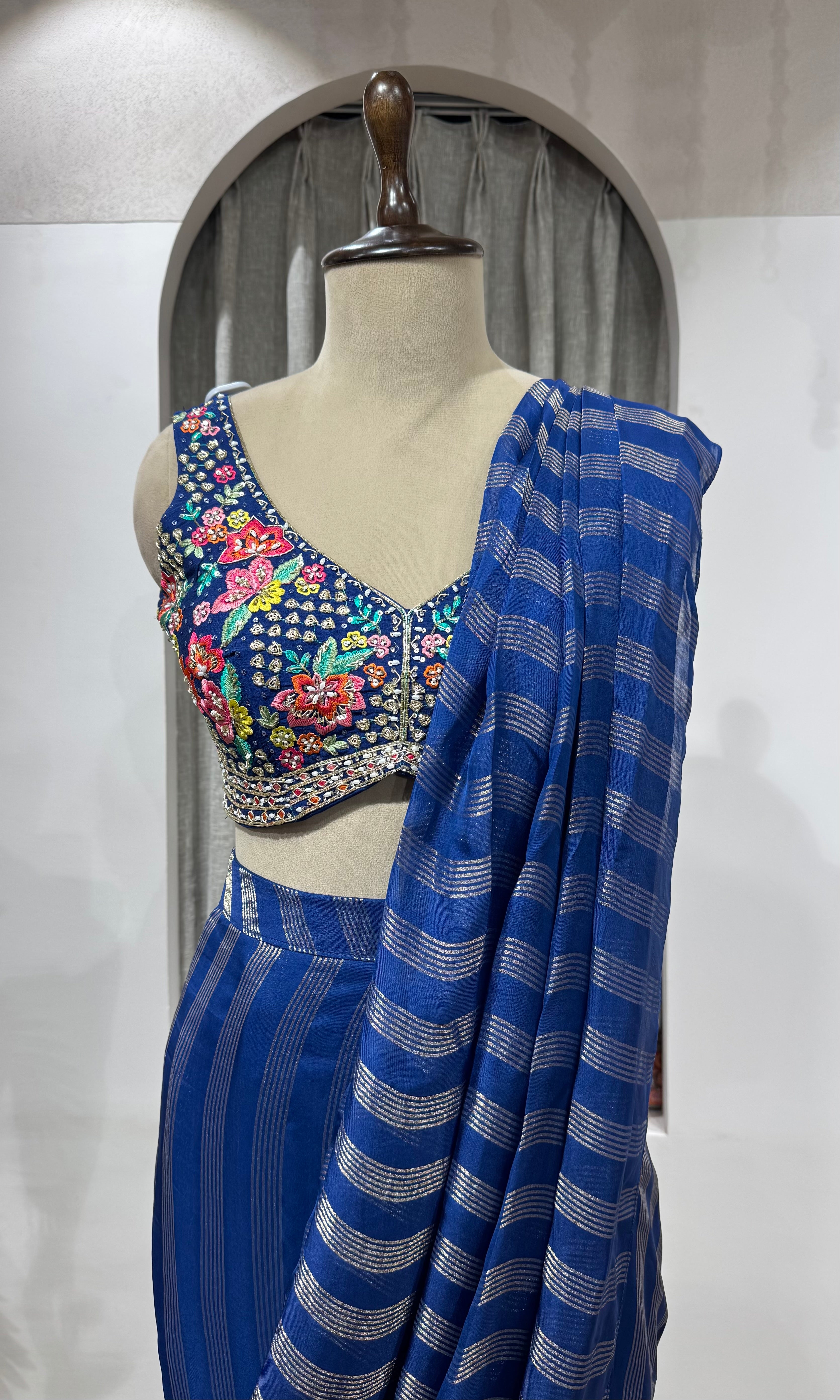 blue and silver striped Drape saree with intricate blouse