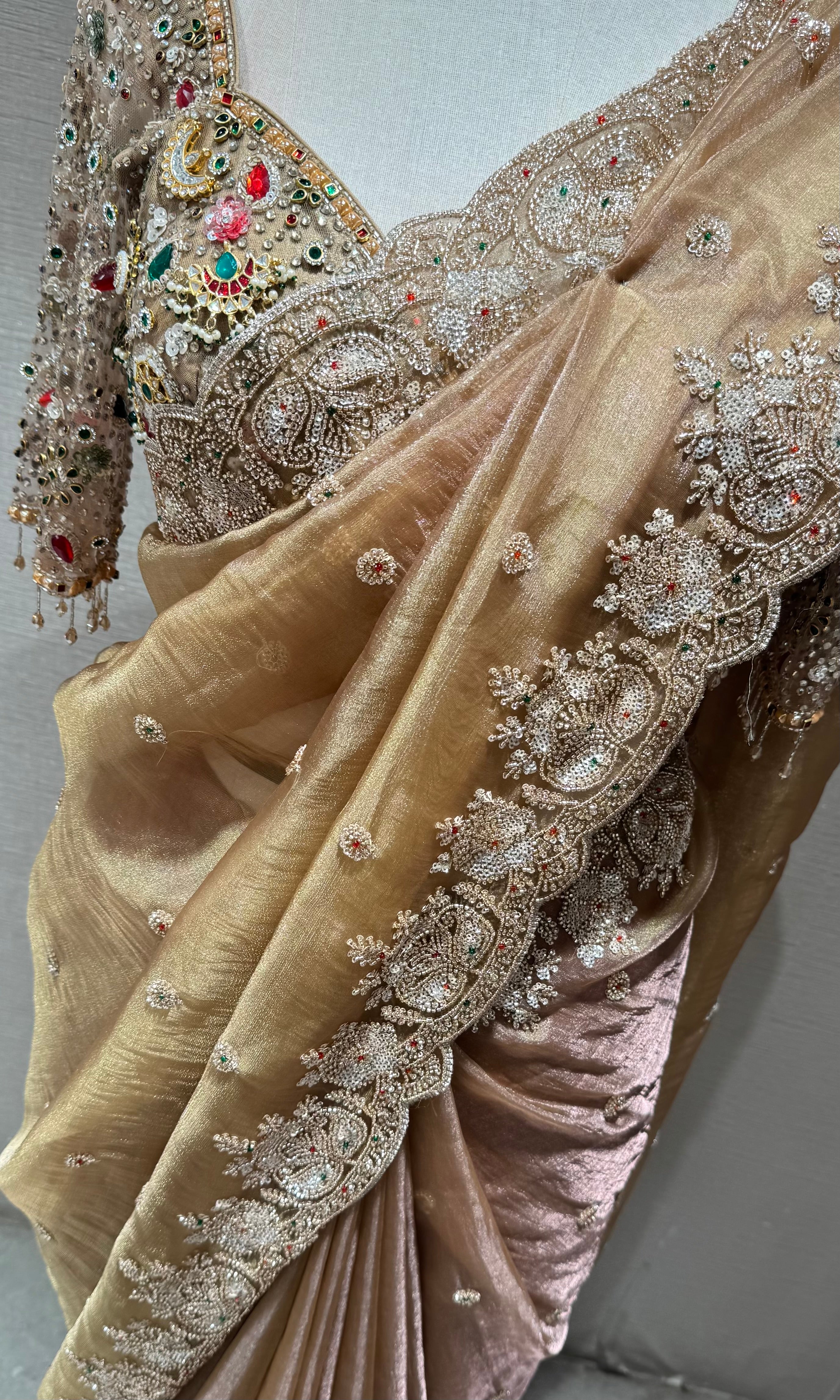 beige net designer saree with embroidered blouse