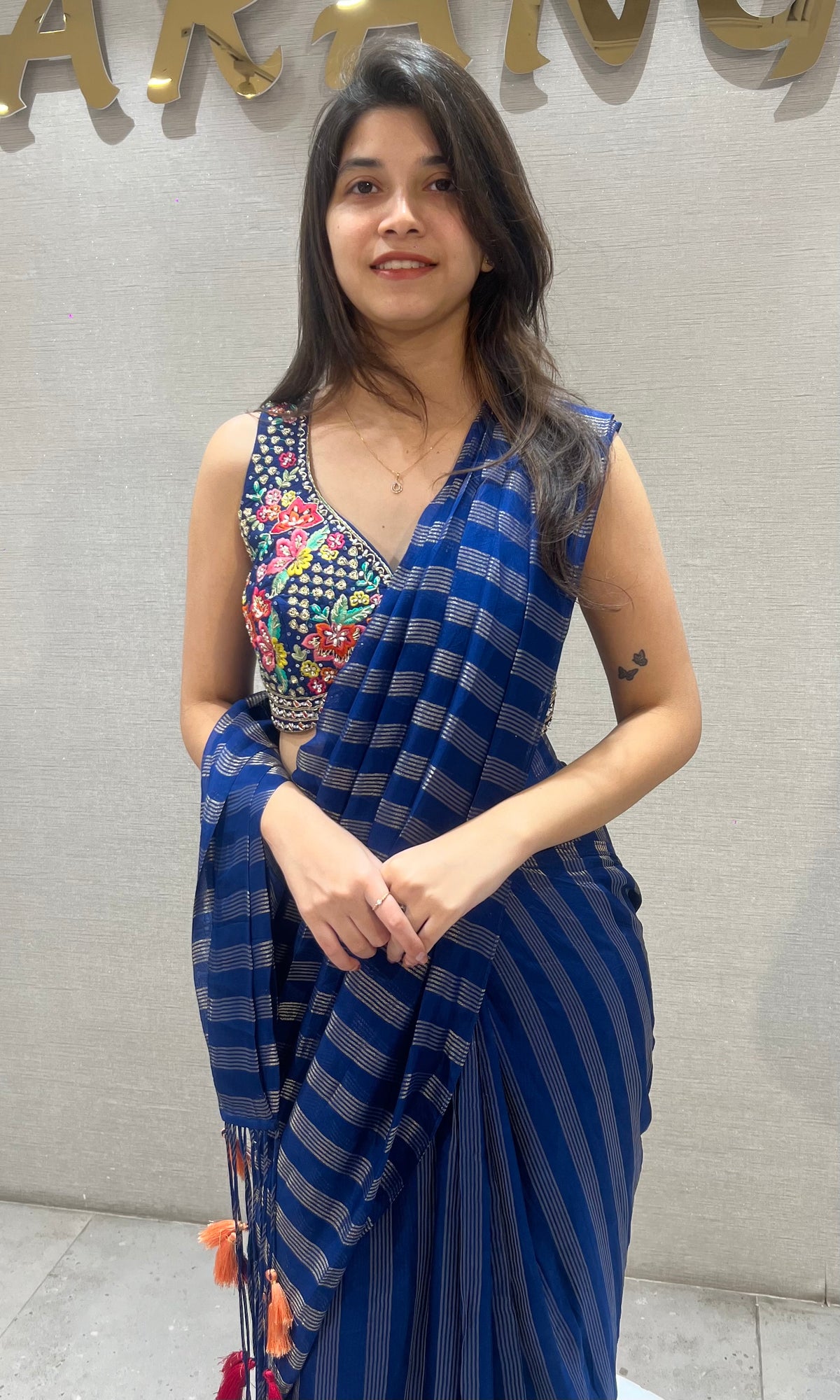 blue and silver striped Drape saree with intricate blouse