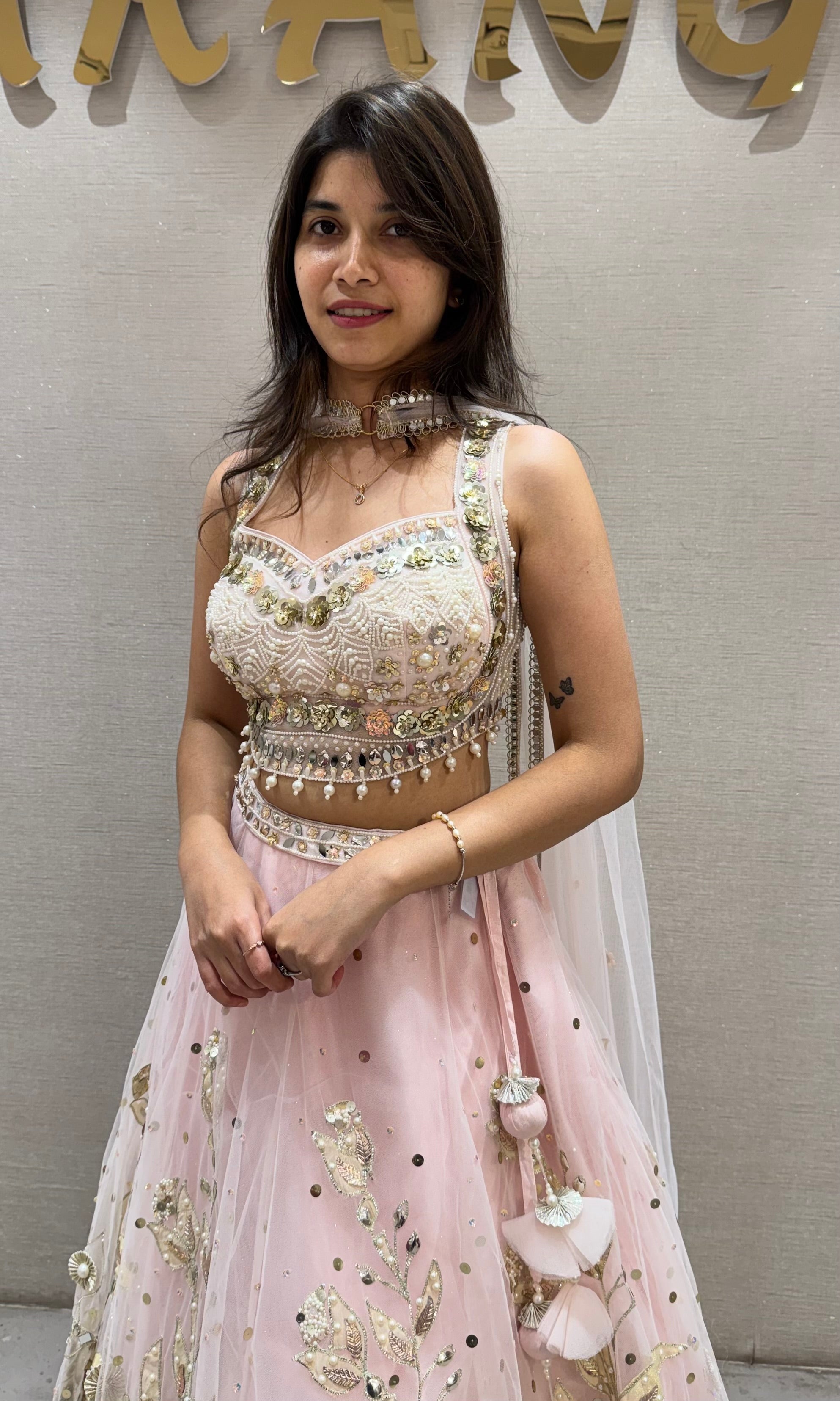 Pastel Pink Net Embroidered Bridal Lehenga