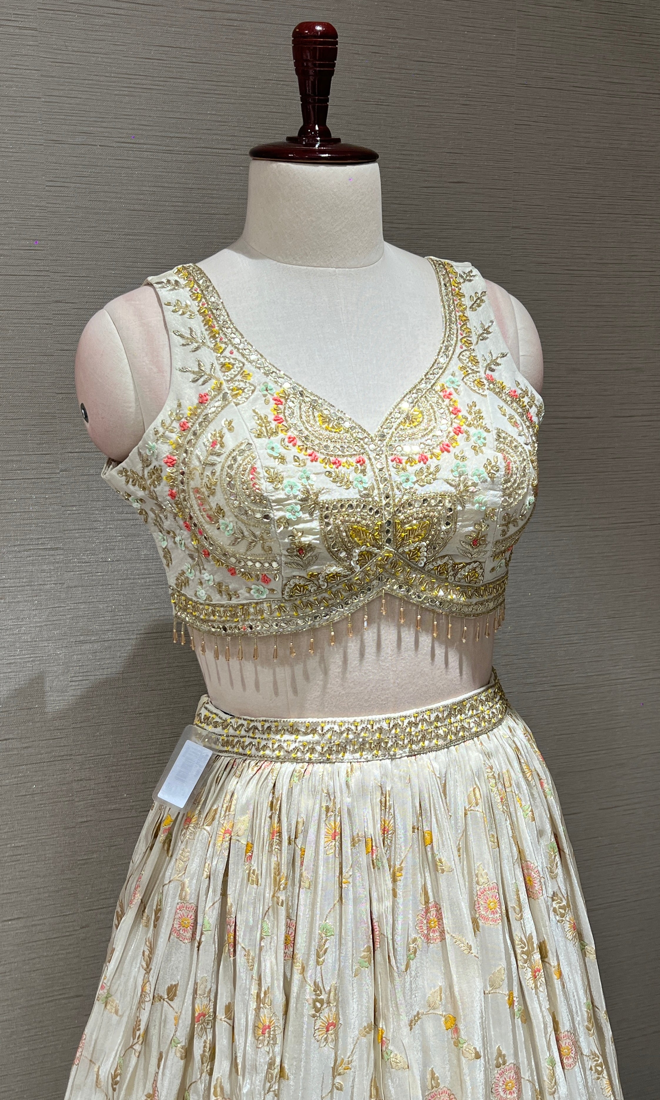 Half white Floral embroidred Lehenga with Golden Border