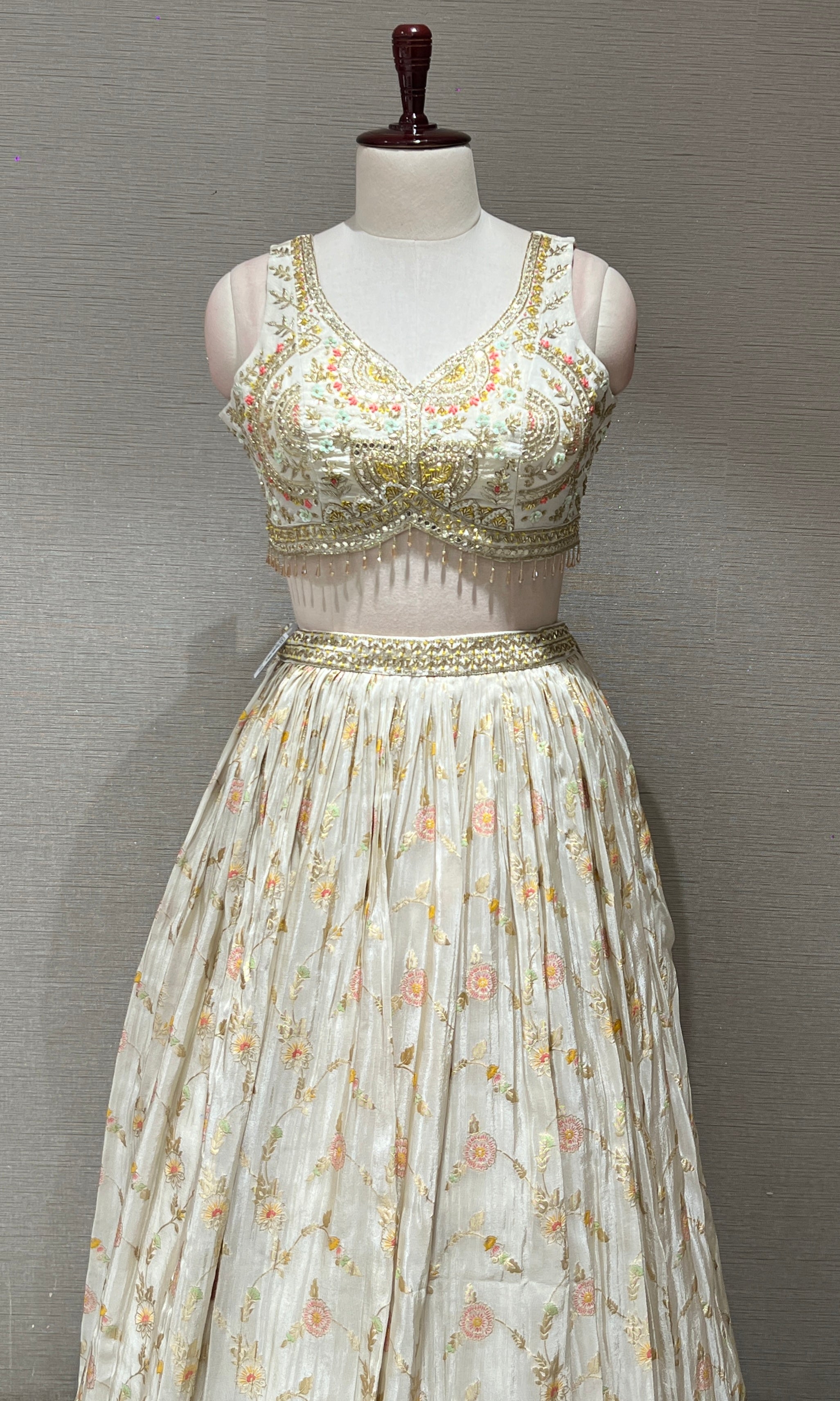 Half white Floral embroidred Lehenga with Golden Border