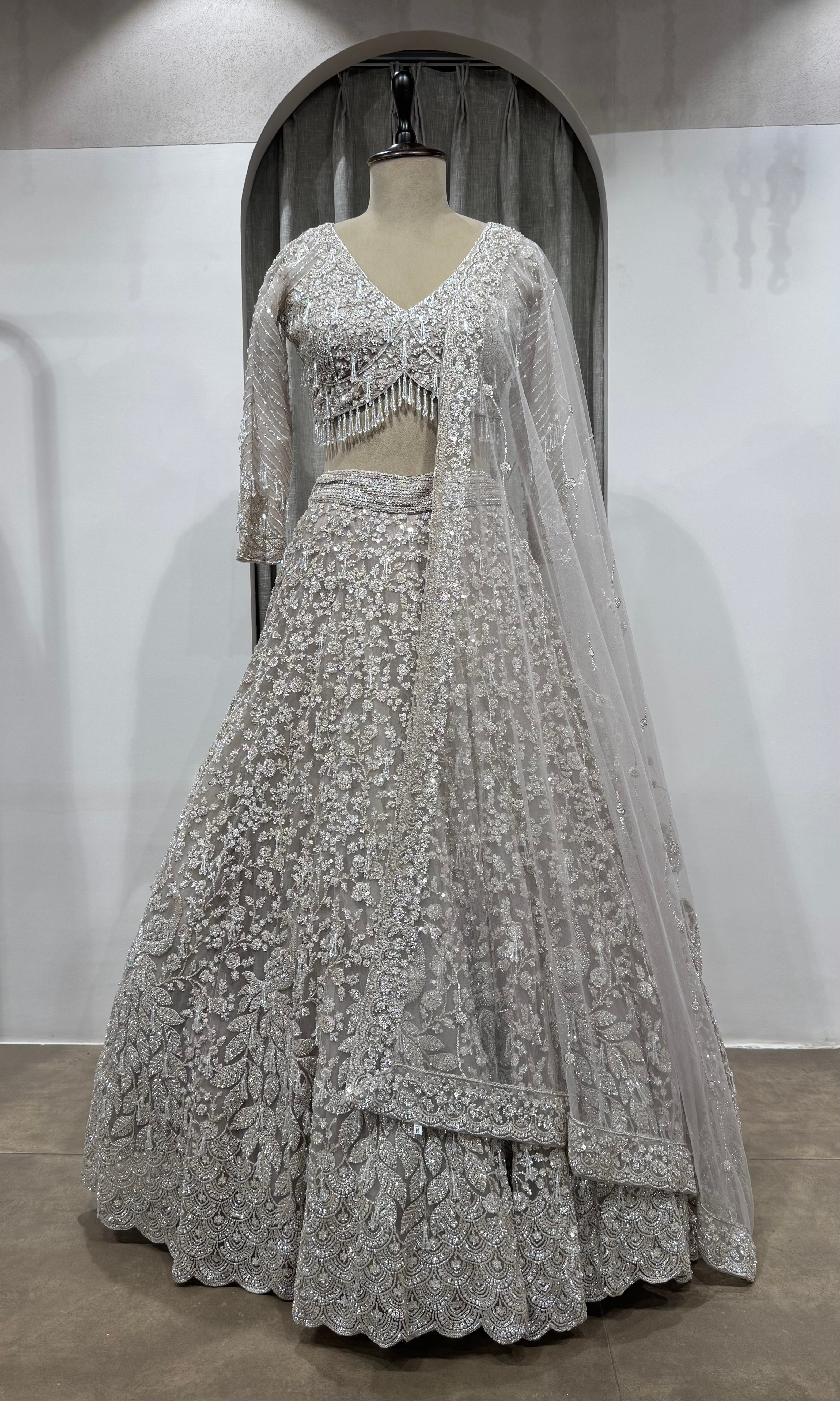 Grey Silver Net Heavy Embroidered Bridal Lehenga Set