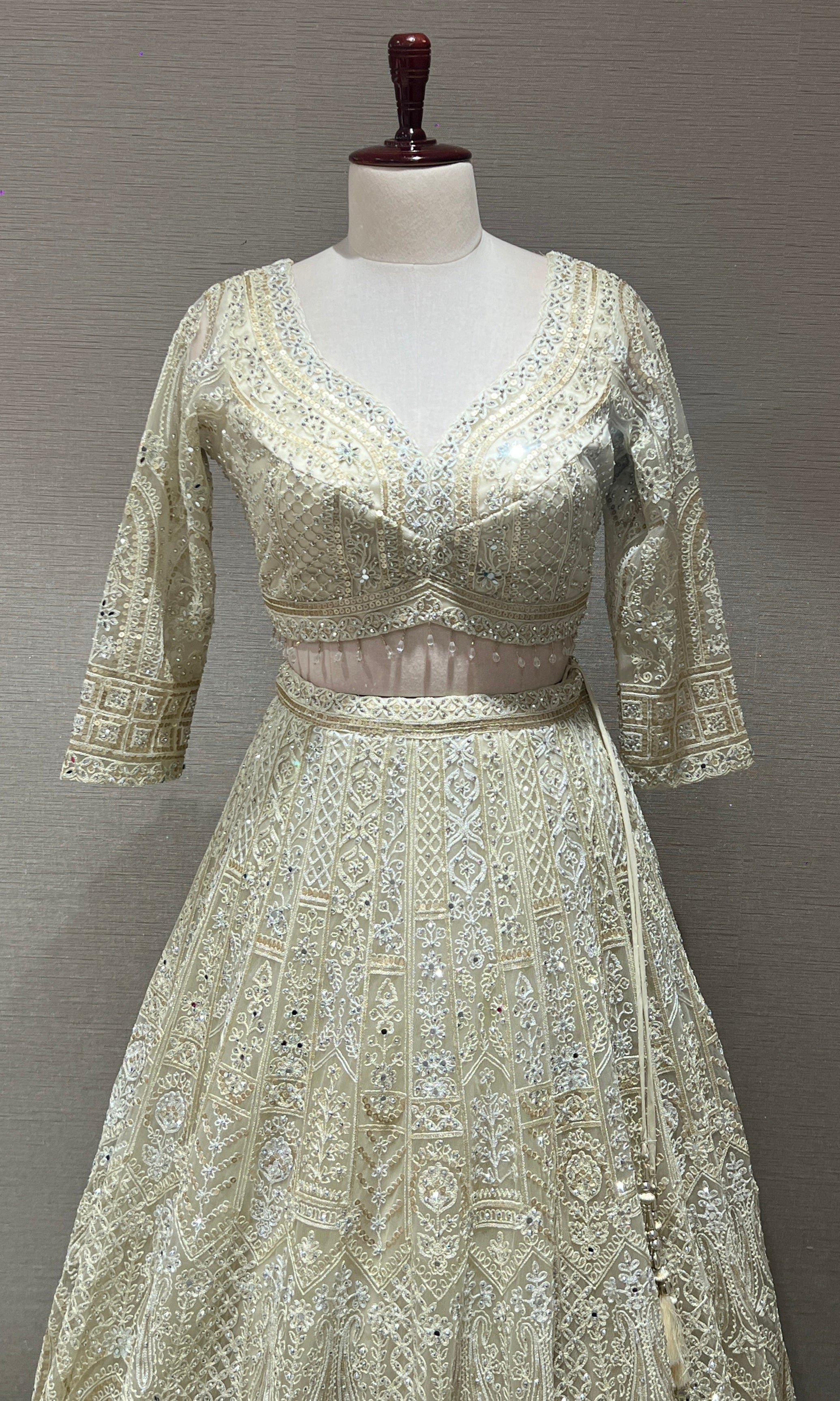 Half white ZARDOZI EMBROIDERED LEHENGA