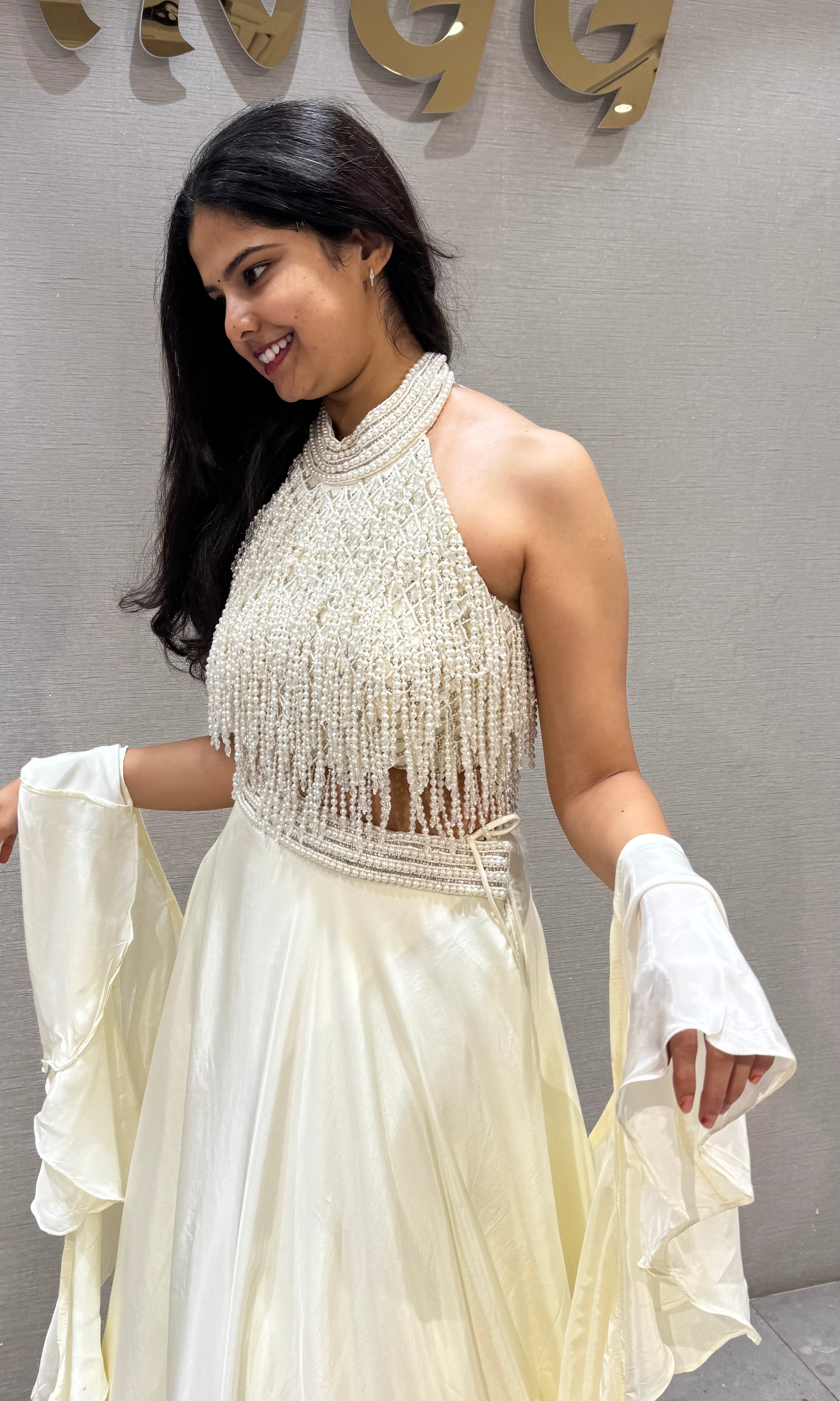 Cream Halter Lehenga with Beaded Fringe Ruffled Sleeves