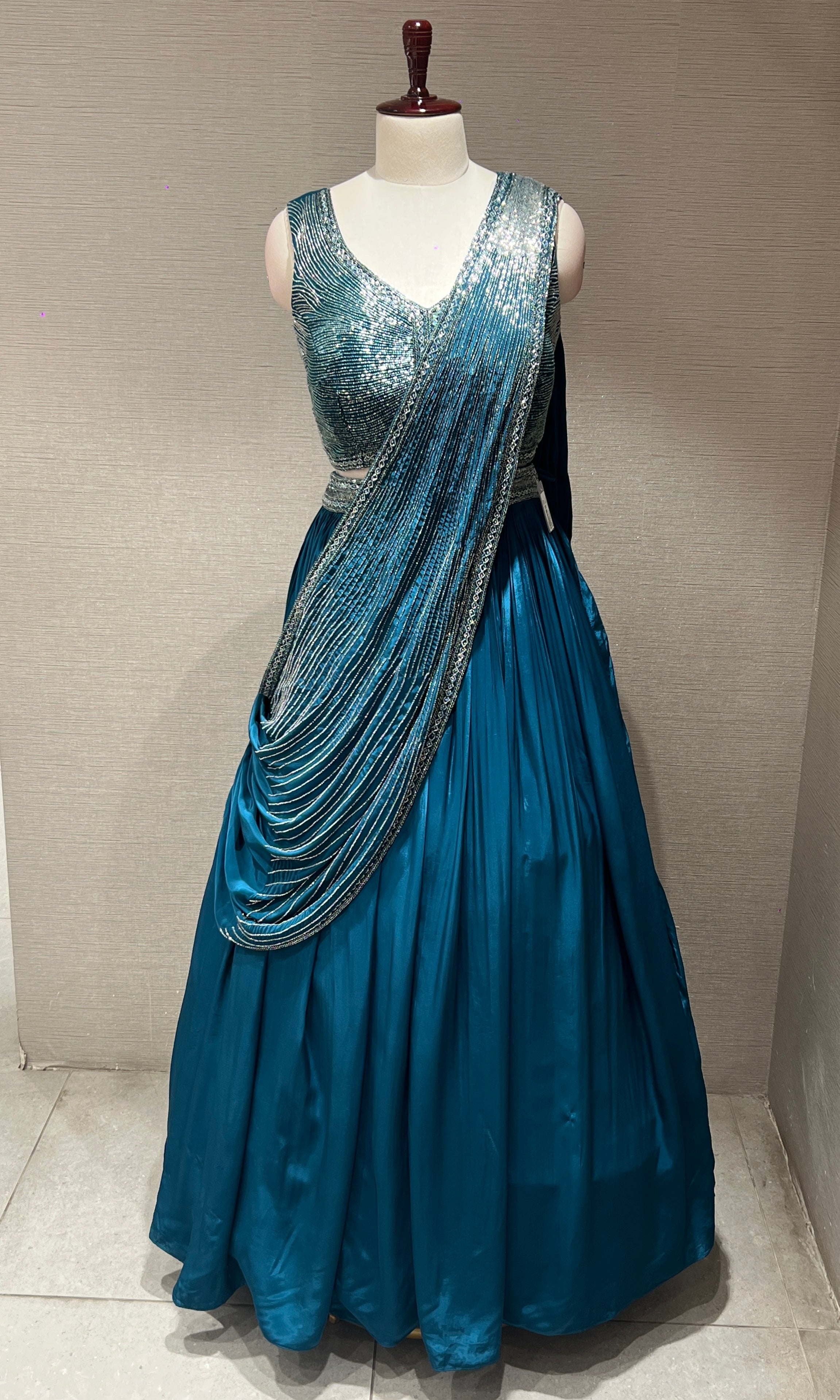 Peacock green Lehenga with draped sequins Pallu